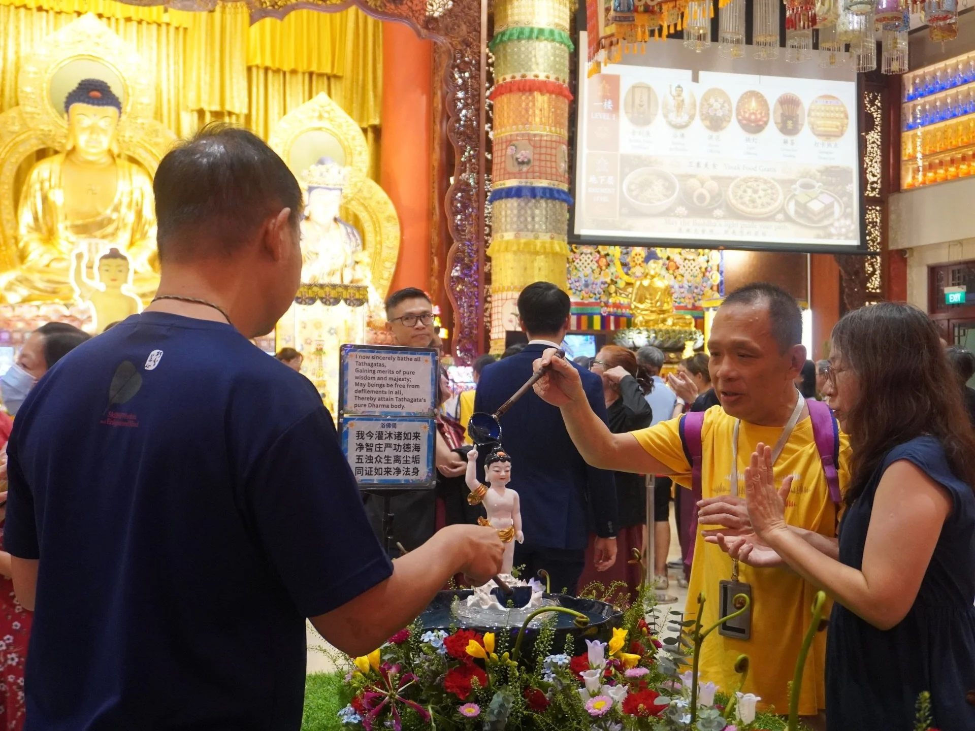 Day 1 of Auspicious Vesak 2026 was filled with joy, learning, and meaningful moments!

From the sacred Bathing of the Buddha ritual and the Twelve Deeds of the Buddha Exhibition, to cultural activities, vegetarian delights, and interactive experience