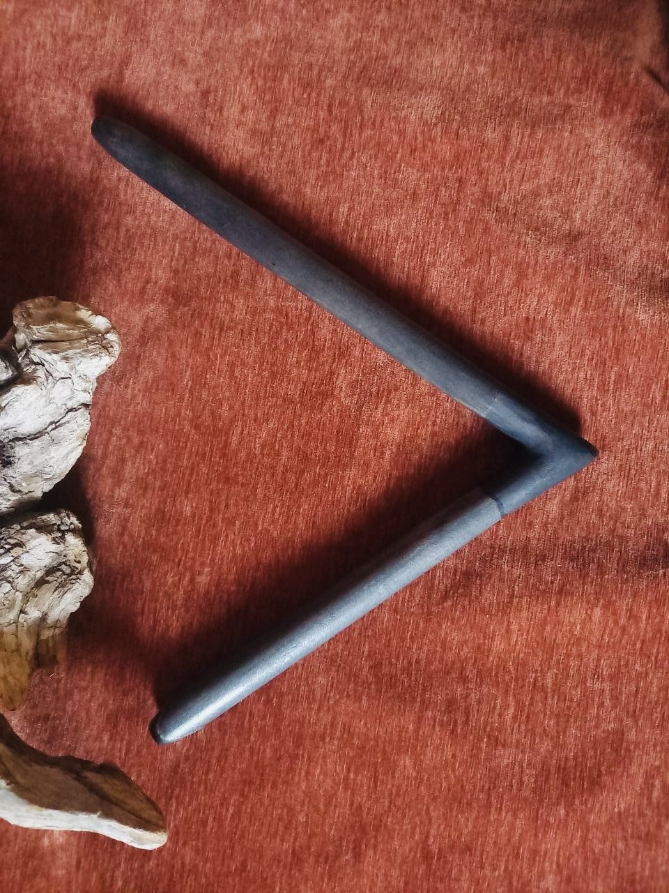 Handcrafted black wooden tepi applicator for rapé ceremonies. Smooth airflow, ergonomic design, and natural materials for sacred ritual use.