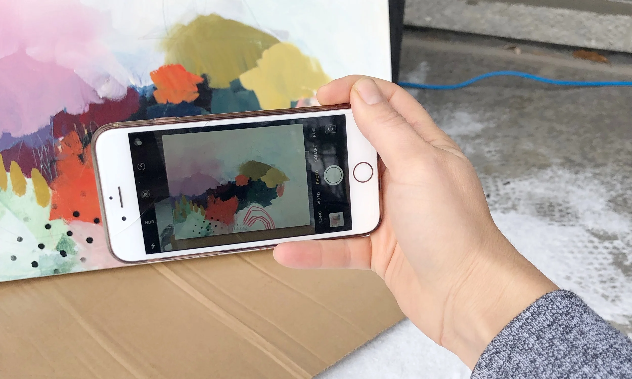 Line up edges of artwork as close to the edges of the viewfinder as possible. Keep lines straight.