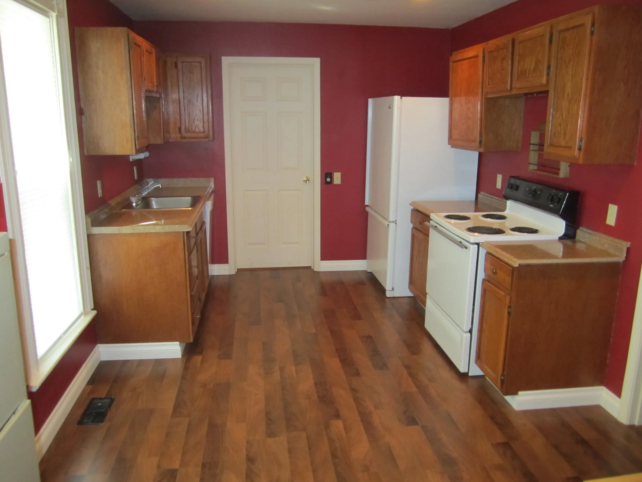 Morris St kitchen view BEFORE.JPG