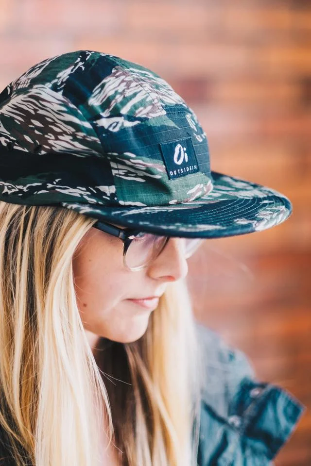 Blonde Girl Wearing an OutsideIn Camoflauge Five Panel Hat.jpg