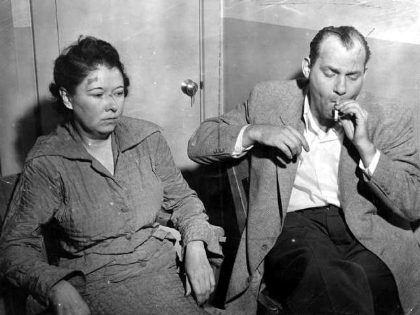 Bonnie Heady and Carl Hall in police custody.