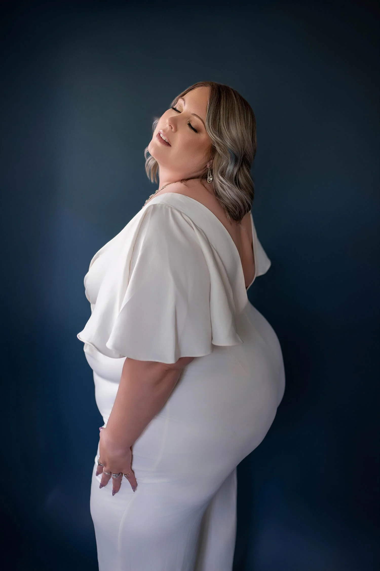 Size 32 - White Jumpsuit with Flutter Sleeve