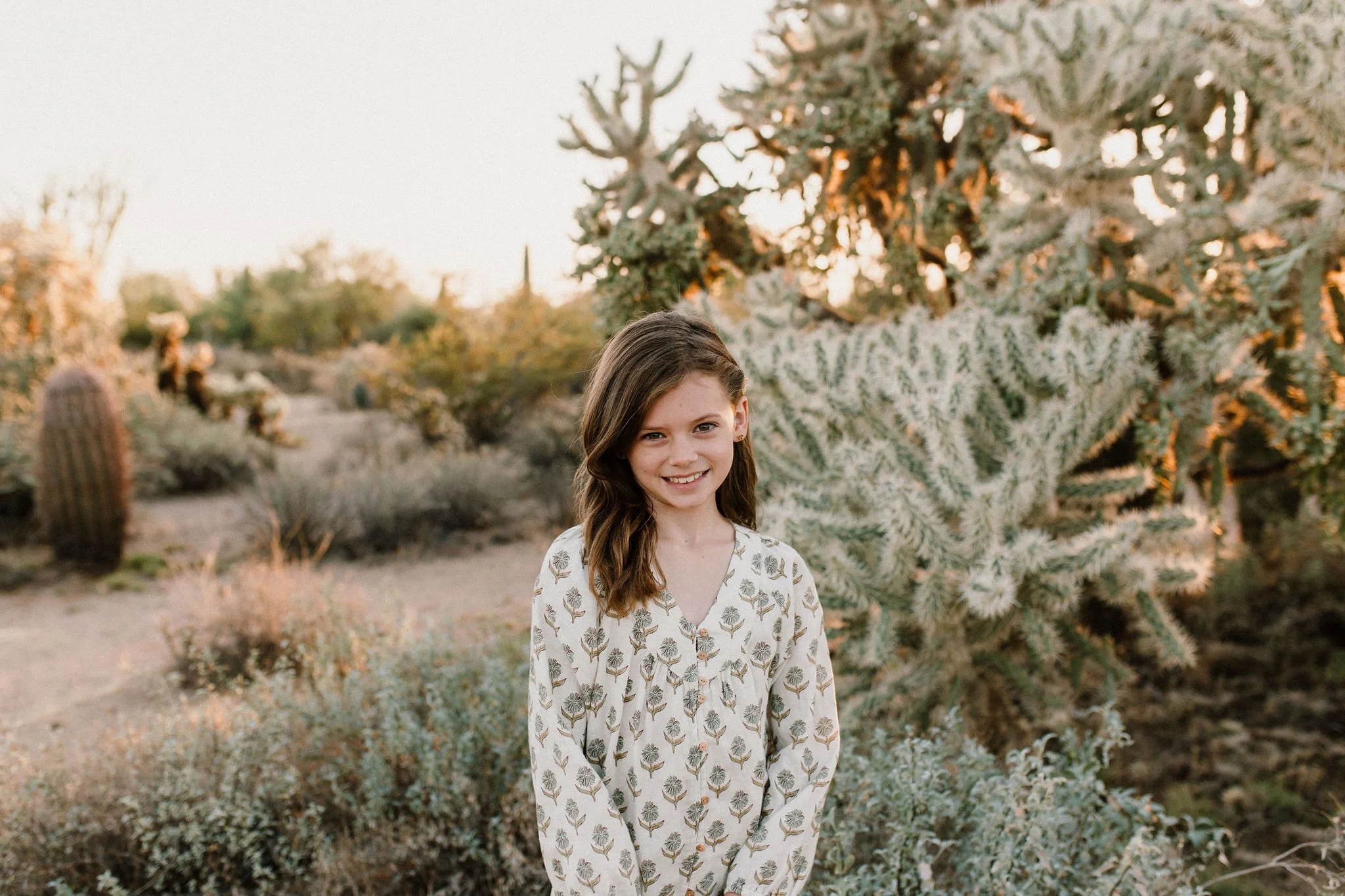 daughter smiling in the Arizona desert captured by Mesa family photographer