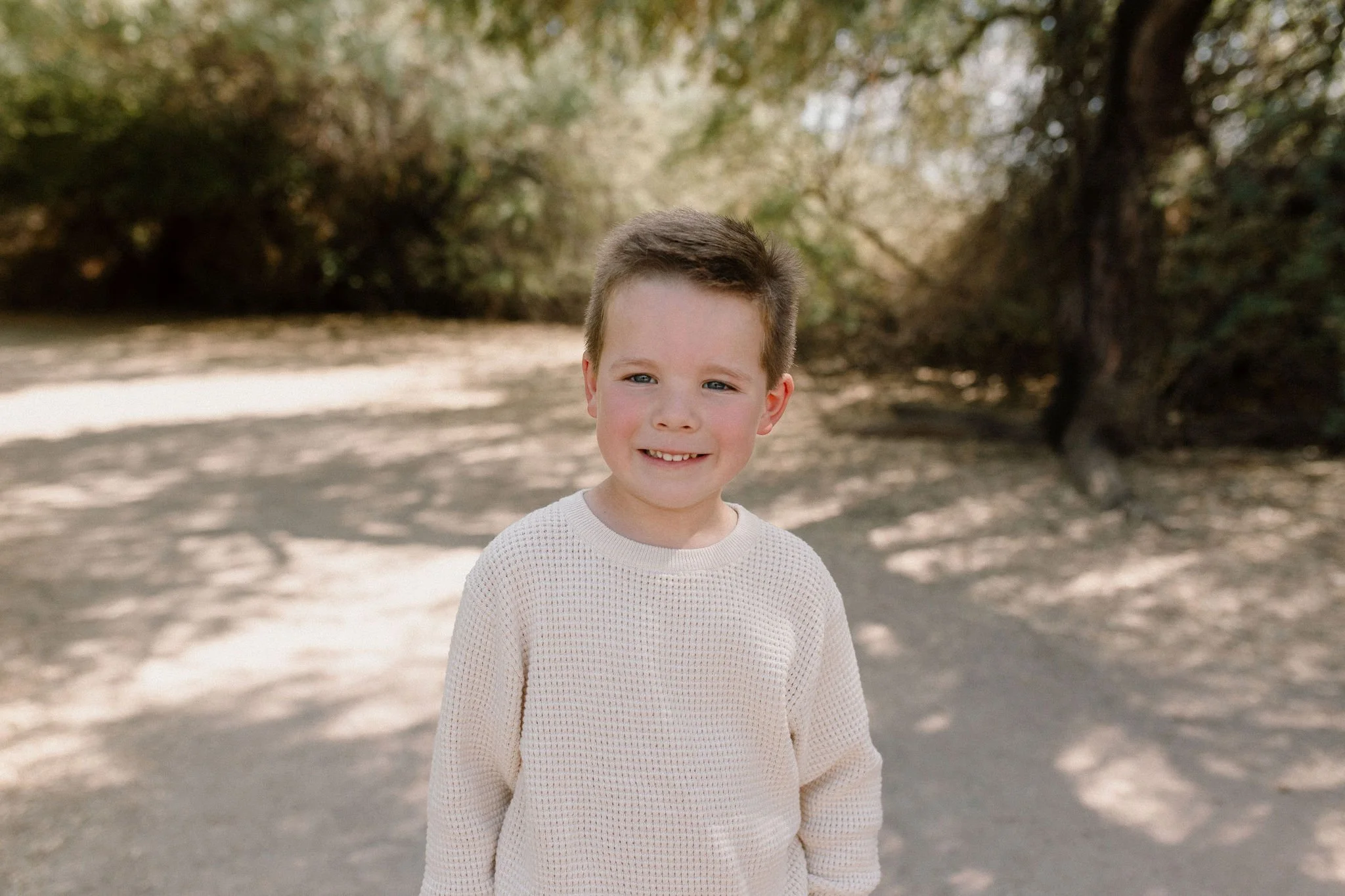 toddler boy smiling at Gilbert Arizona family photographer