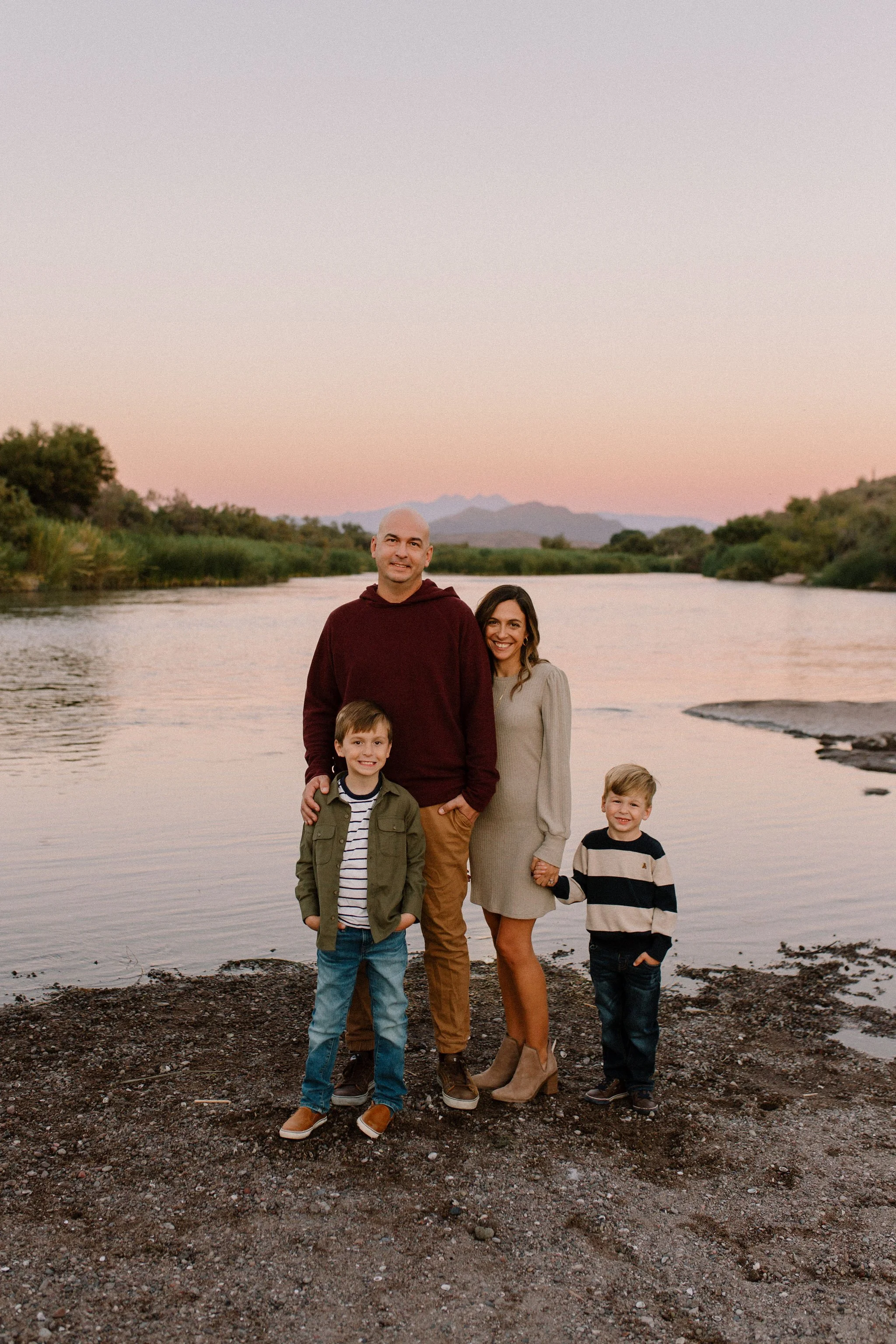 family standing together during blue hour at the Salt River in Arizona