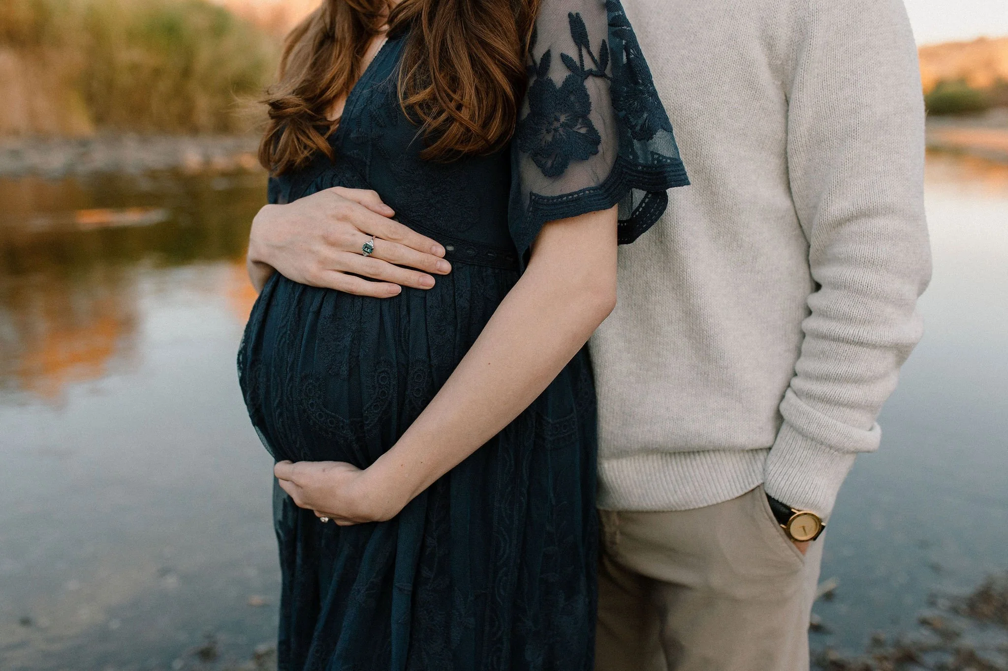 pregnant mom holding belly during Mesa maternity photography session