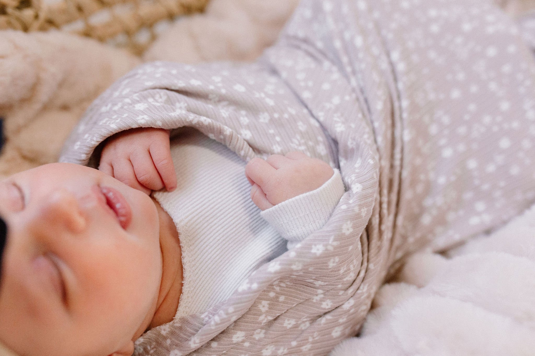 close up detail shot of newborn baby hands and fingers