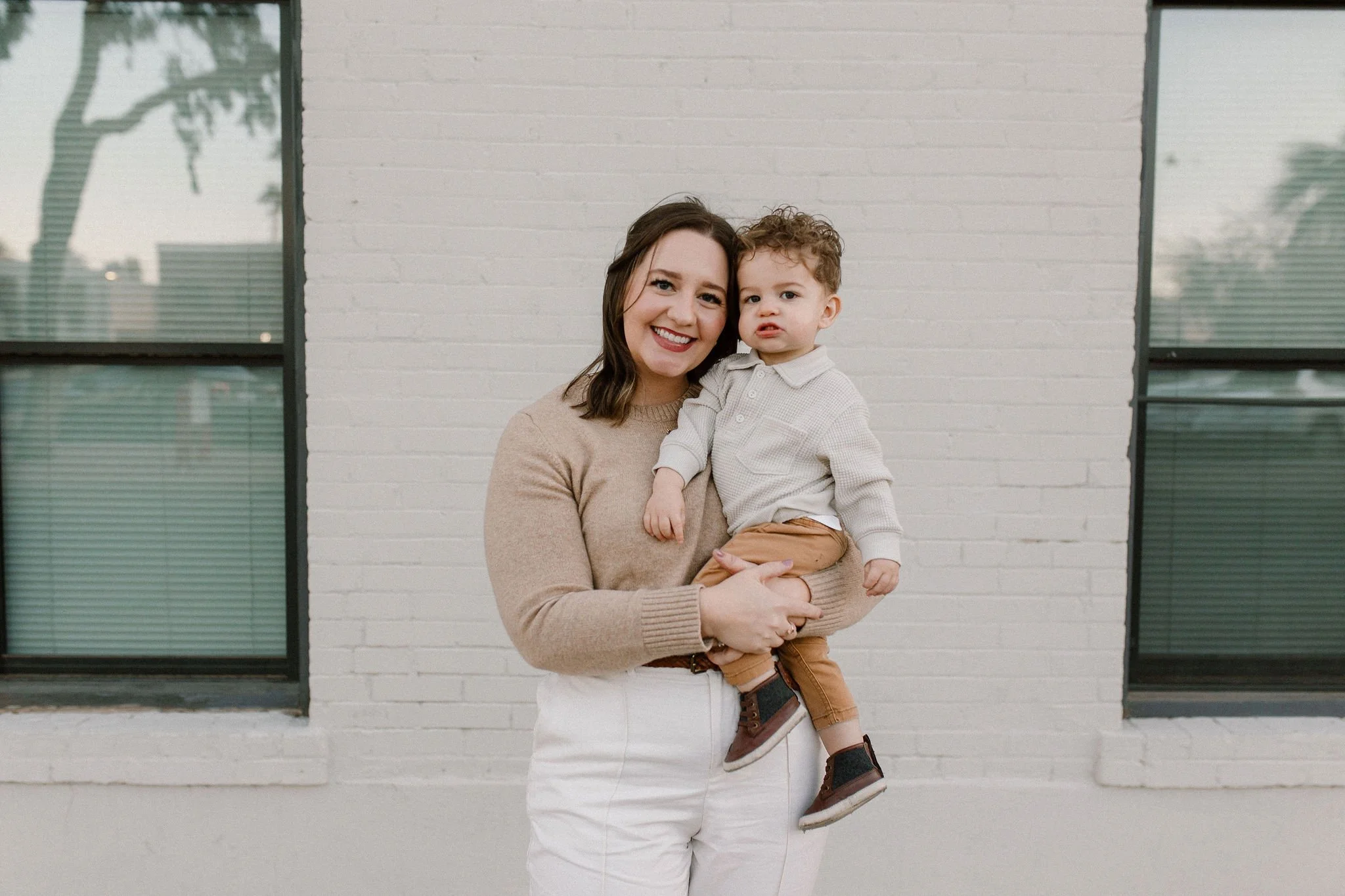 mom and son smiling during downtown mesa family photos