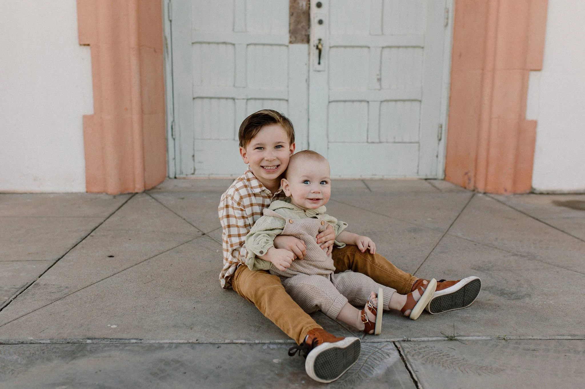 brothers sitting together during extended family photos