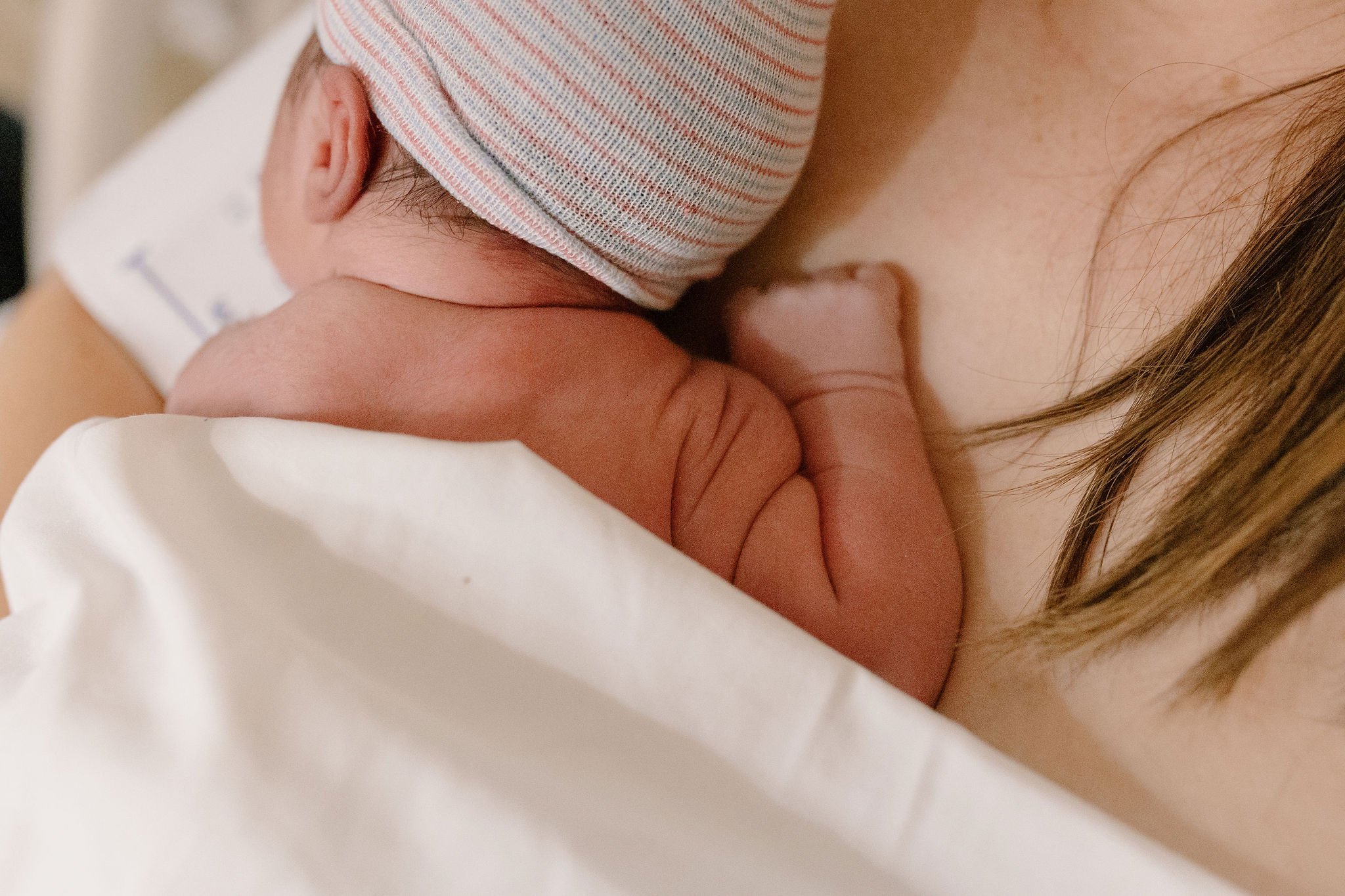 newborn baby details during golden hour birth photography session