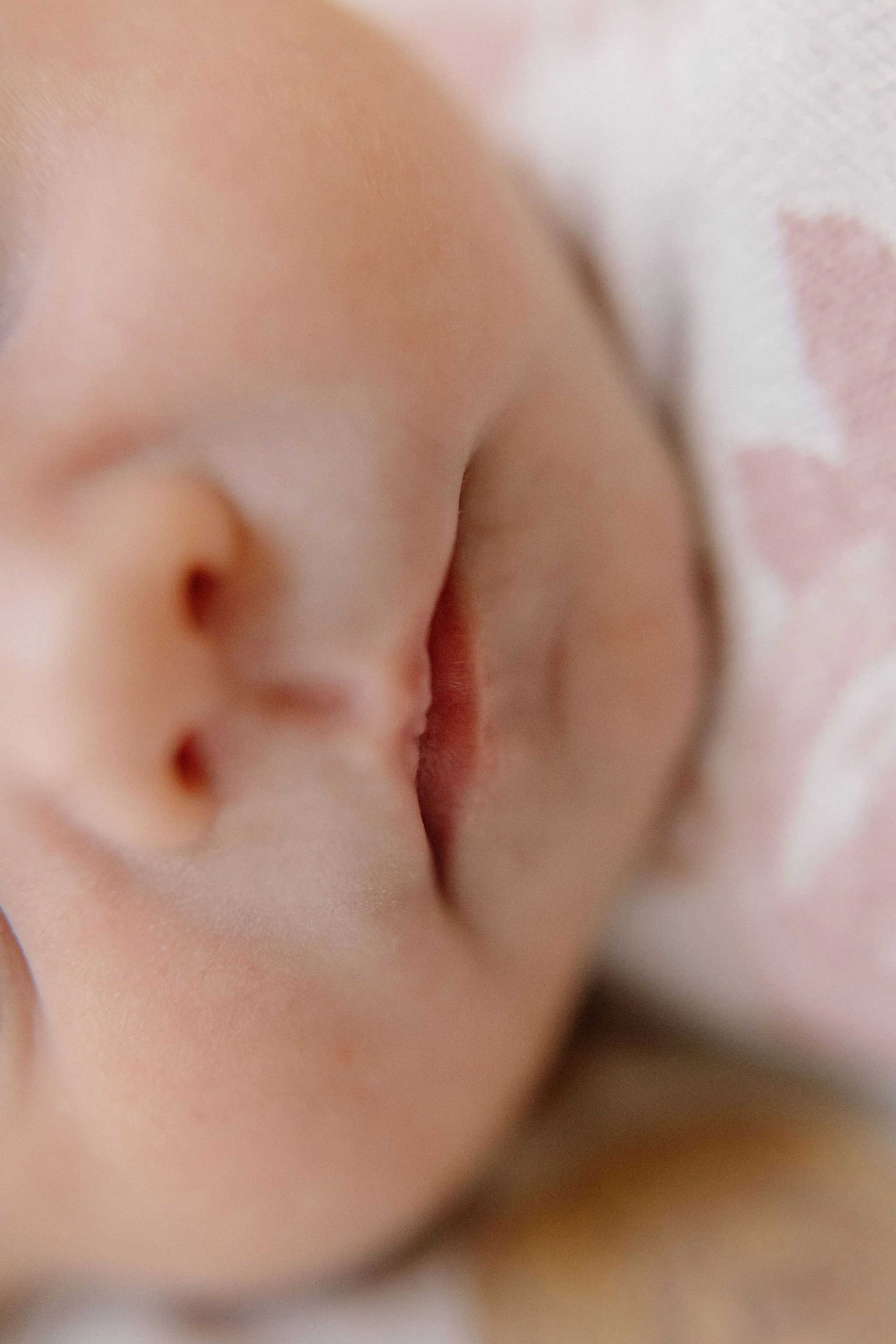 close-up detail shot of baby lips captured by newborn photographer
