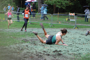 Danielle falling in the mud at the 2011 PA Championships.