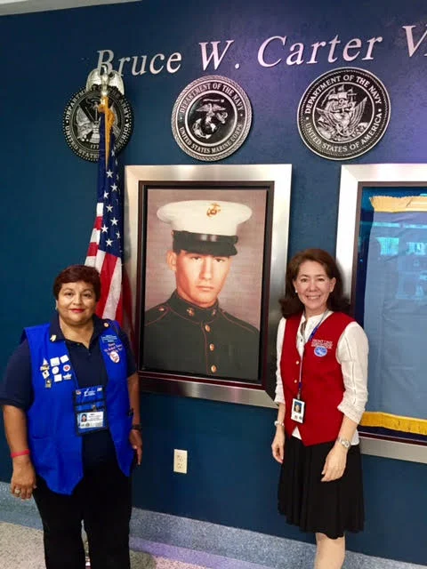 Pictured here (click photo to enlarge) at the Bruce W Carter VA Medical Center, Miami, FL is Maria Lacayo VAVS Rep. for UVS and Astrid Isom a UVS volunteer at the Greeter/Information Desk.