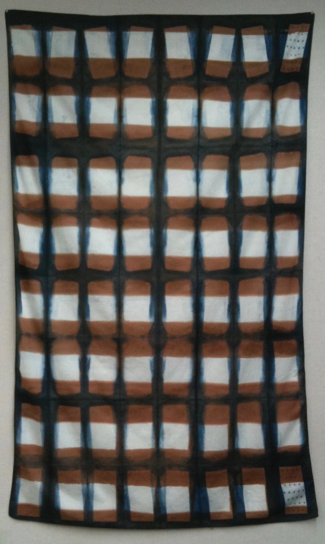 Shibori resist on cotton over-dyed