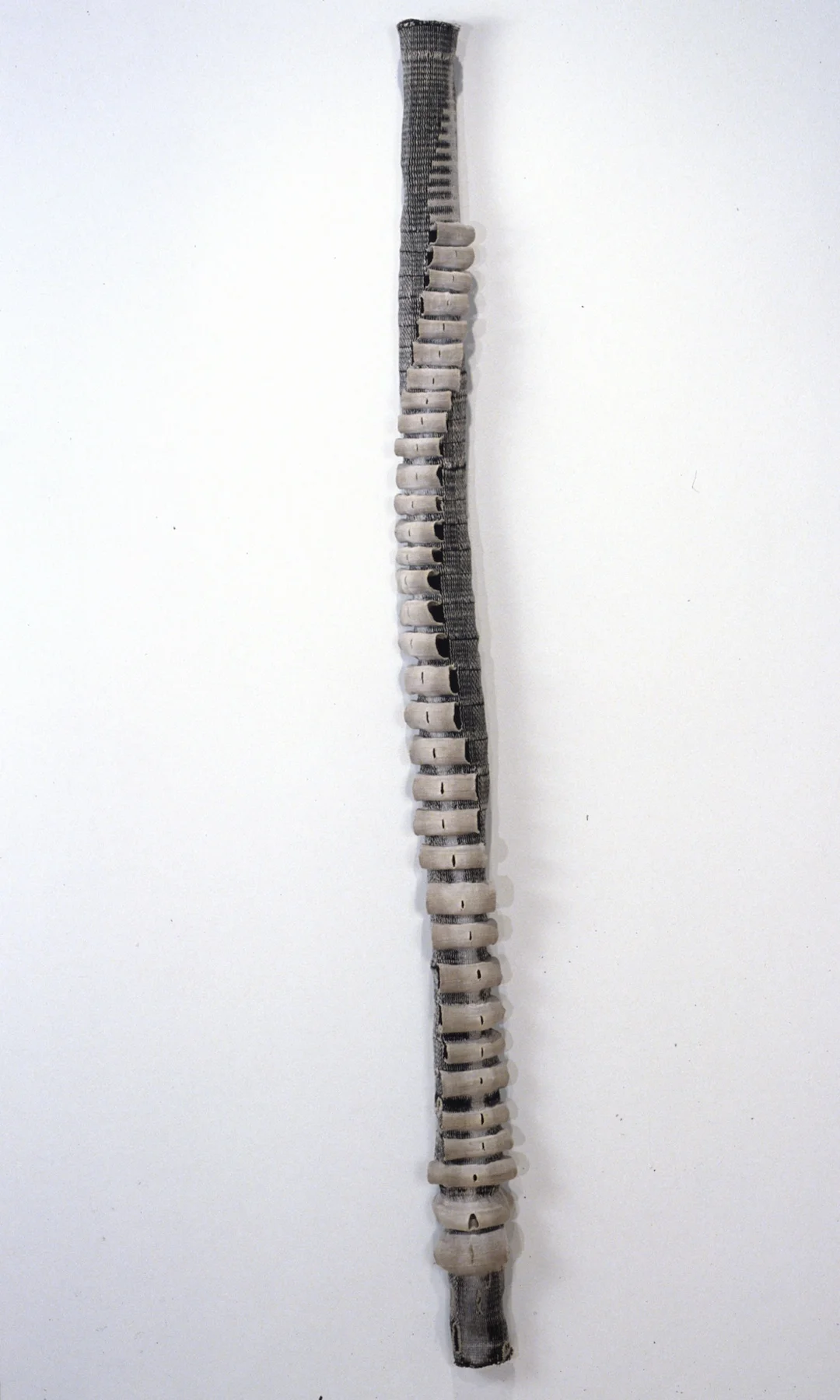 Spine 60"x4"x3" woven, linen, cotton, hardware cloth
