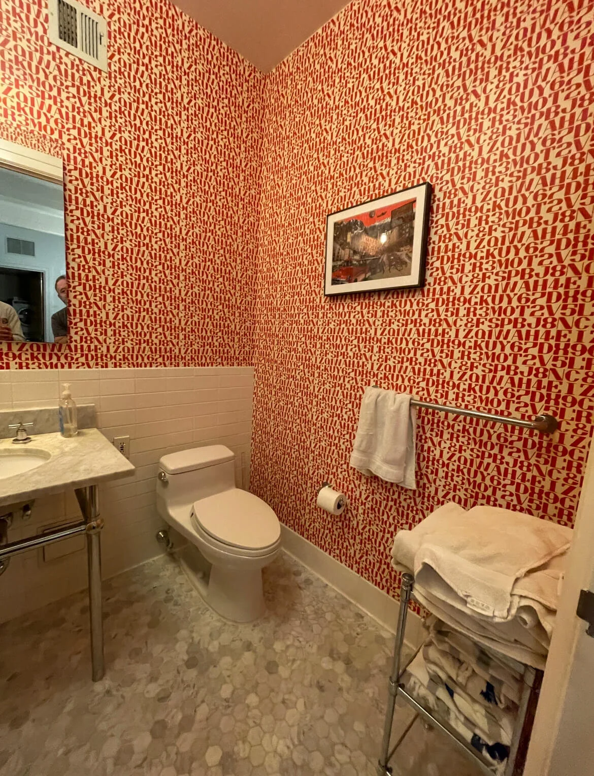 The once-eyesore wallpapered bathroom