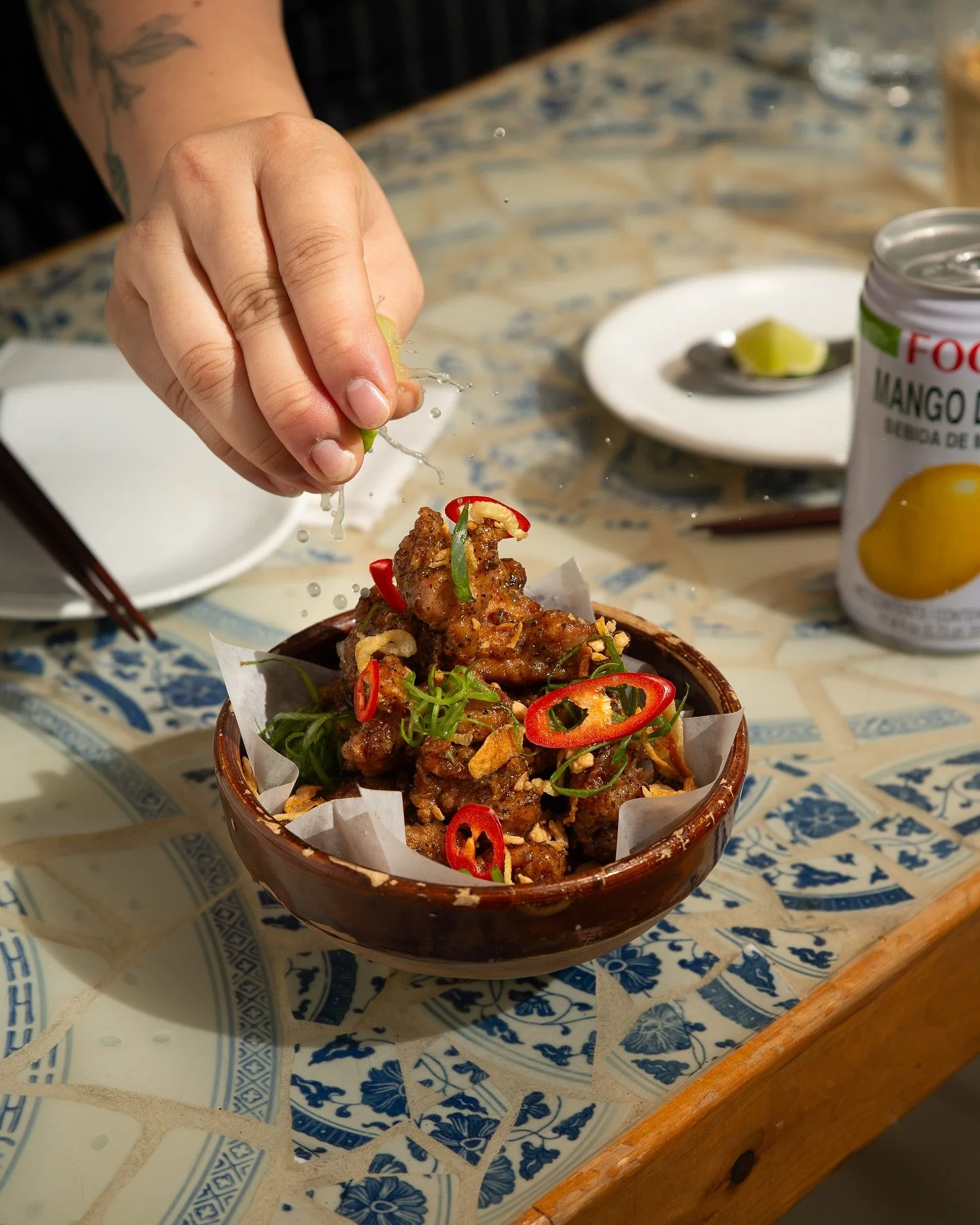 Now *that’s* a squeeze of lime 🍋‍🟩 The perfect compliment to our Kho Quet Chicken!