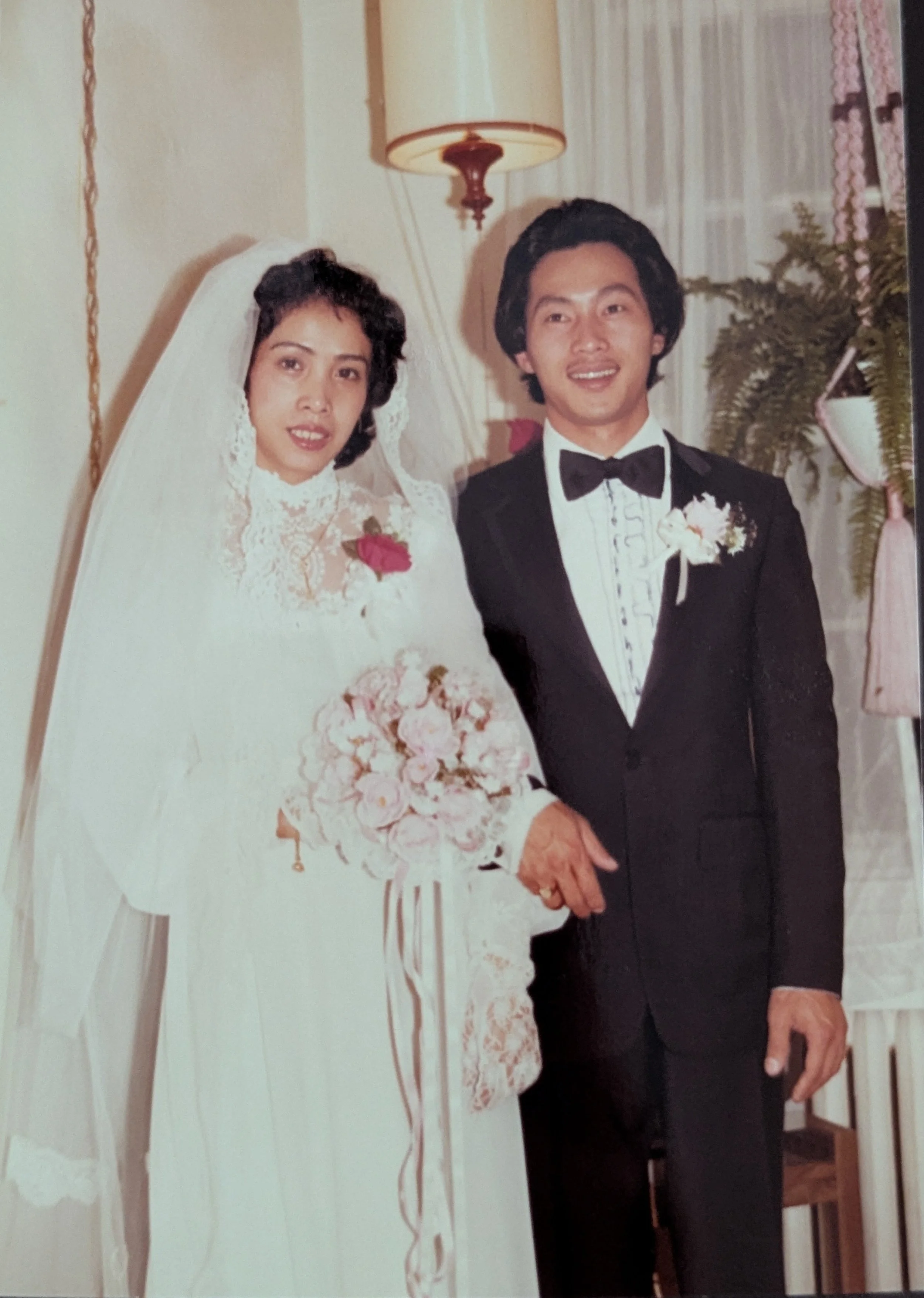 David Huynh's parents wedding photo. 70's style tuxedo and wedding gown.