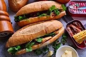 A banh mi cá mòi sốt cà or sardine stewed in tomato from a banh mi cart in Vietnam.