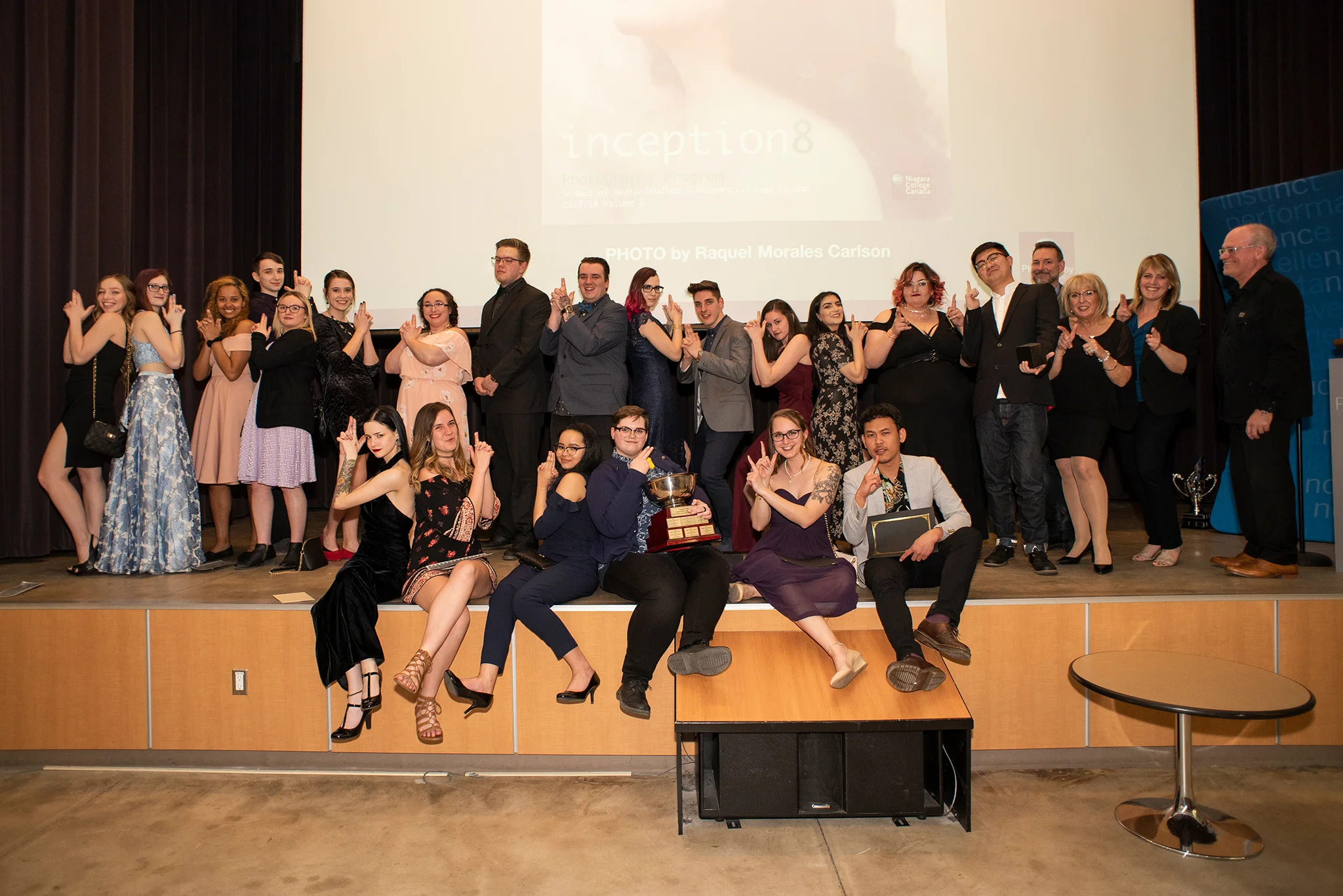 This is one of my favorite photos! This is the my graduating class for our photography program, and most of our instructors. I insisted we do "one Charlie's Angels shot" and was met with some confused looks initially, which I guess is showing my age a little bit? But they nailed it!