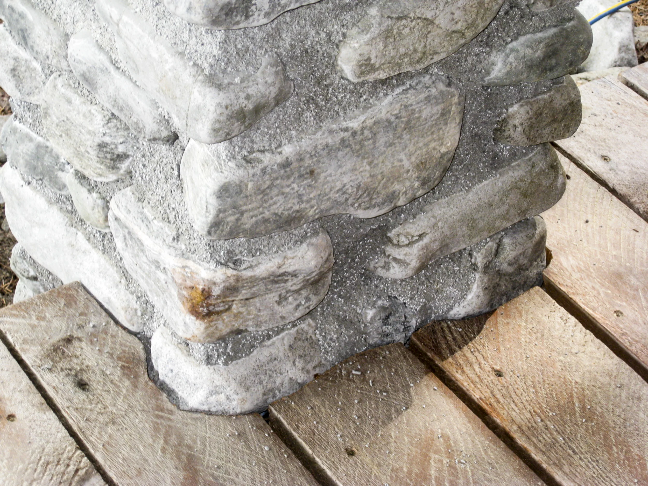 Masonry work and deck detail in the Off the Grid Haines Cabin by Farrell Homebuilding LLC in Alaska 