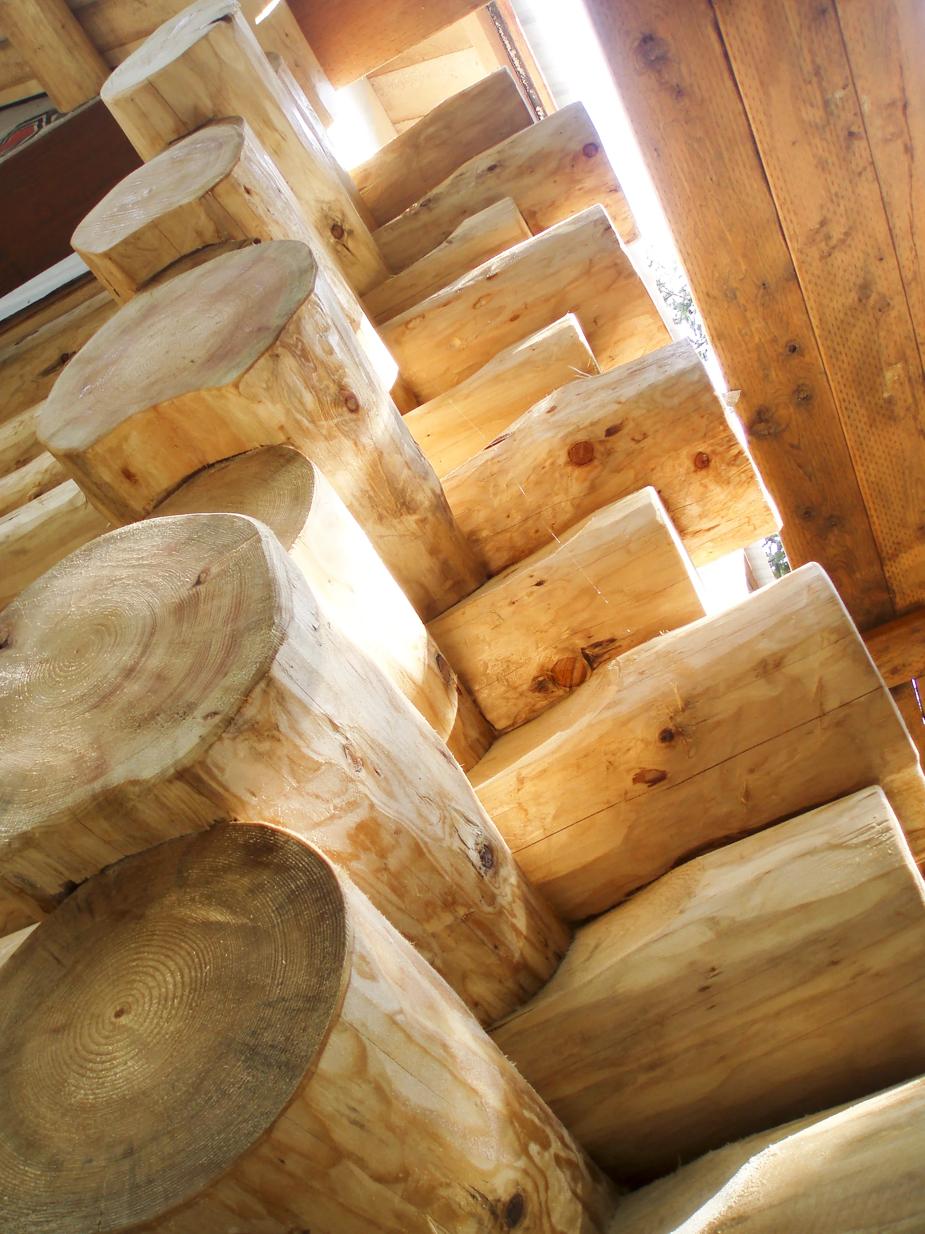 Log woodwork in the Off the Grid Haines Cabin by Farrell Homebuilding LLC in Alaska 