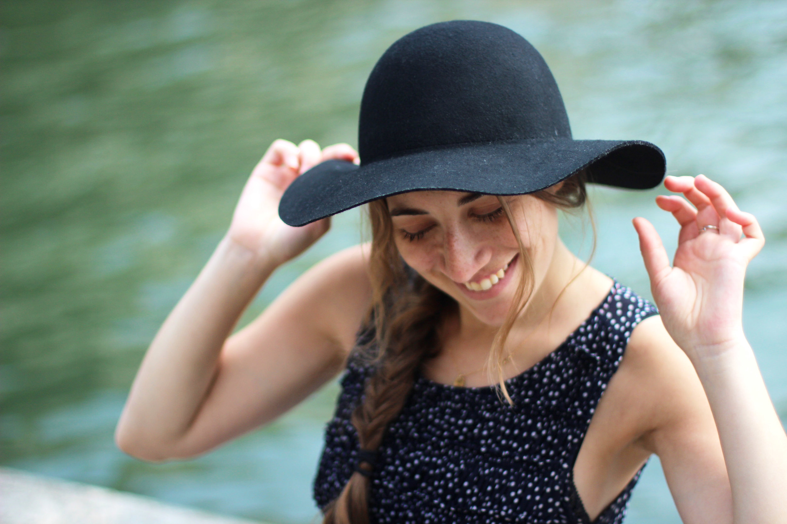 girl smiling hat close up happy original.jpg