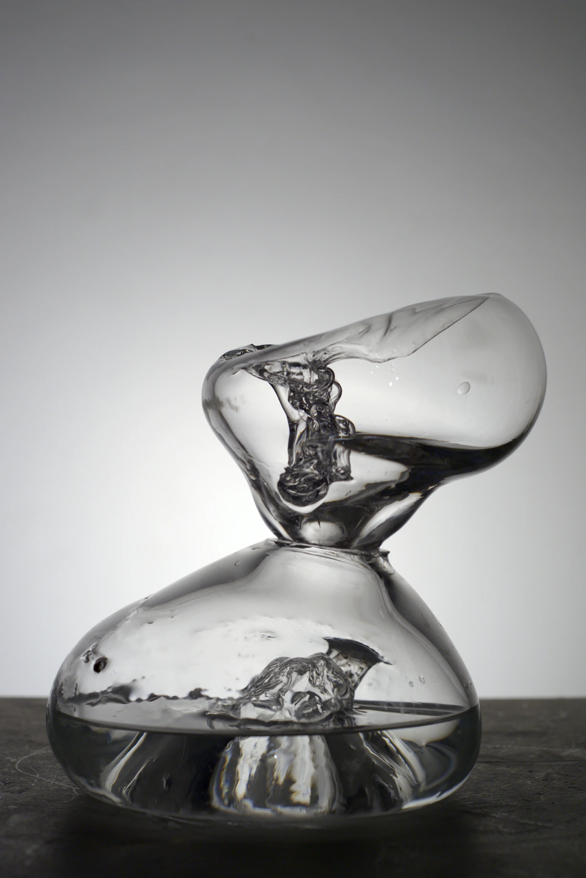 The Chase from the series InDecisive Moments , 2017. Hand-blown glass and water. 9 x 10 x 10"