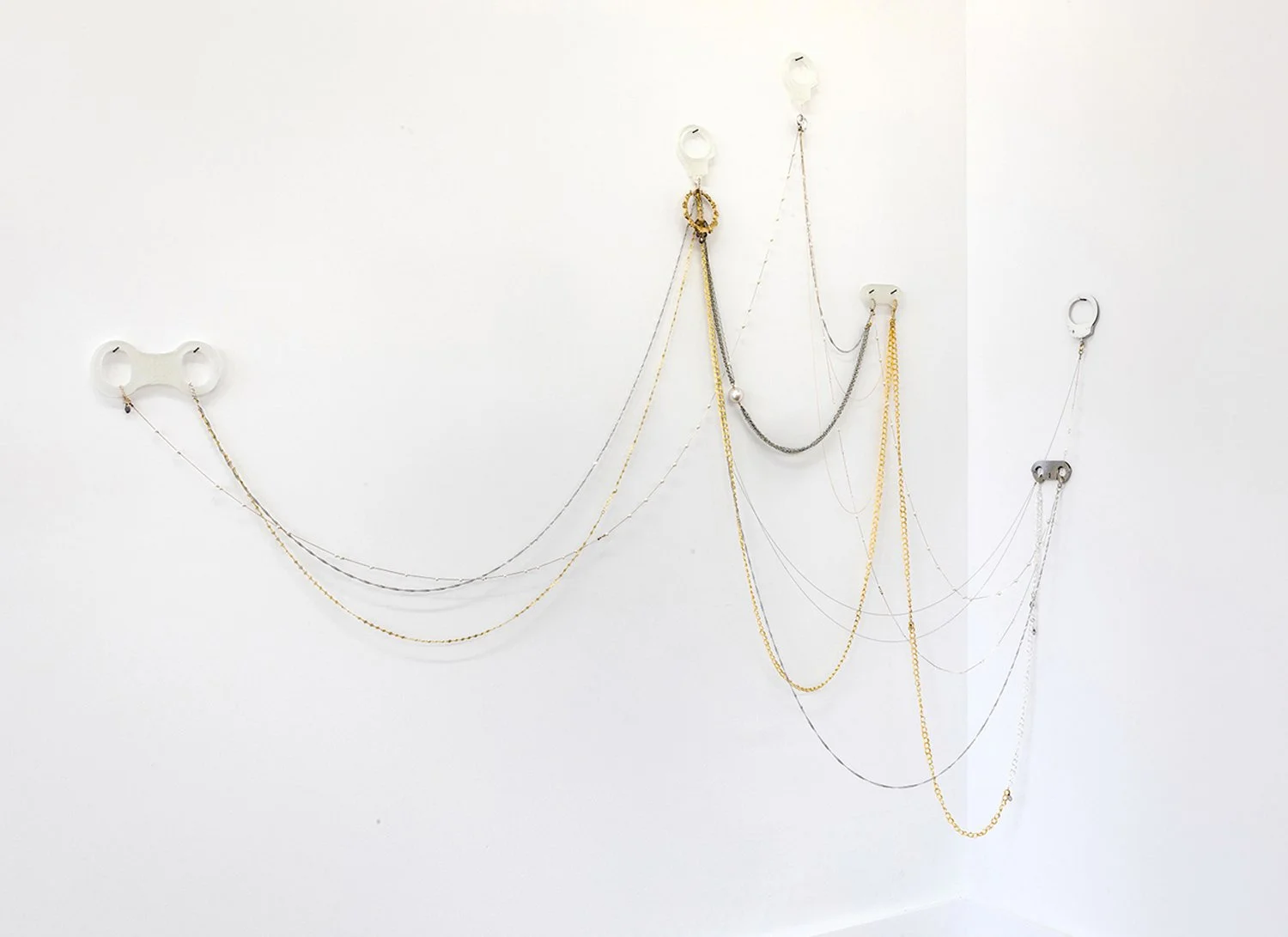    Fly Trap   2017 Handcuffs and costume jewelry Variable dimensions 