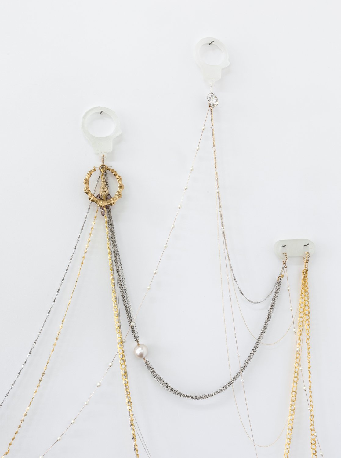    Fly Trap   (detail) 2017 Handcuffs and costume jewelry Variable dimensions 