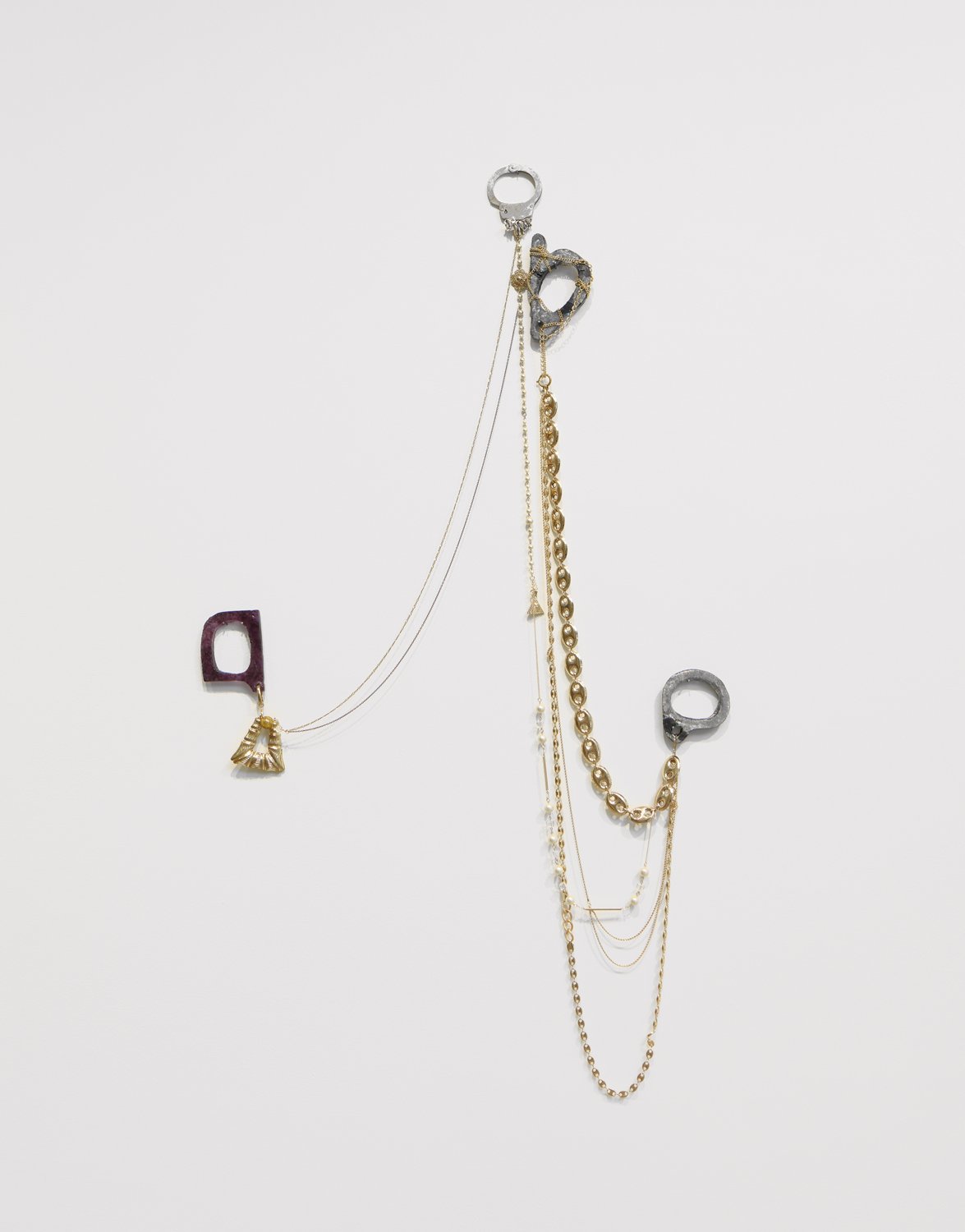    90 Miles of Cuban Links   2017 Handcuffs and costume jewelry Variable dimensions 