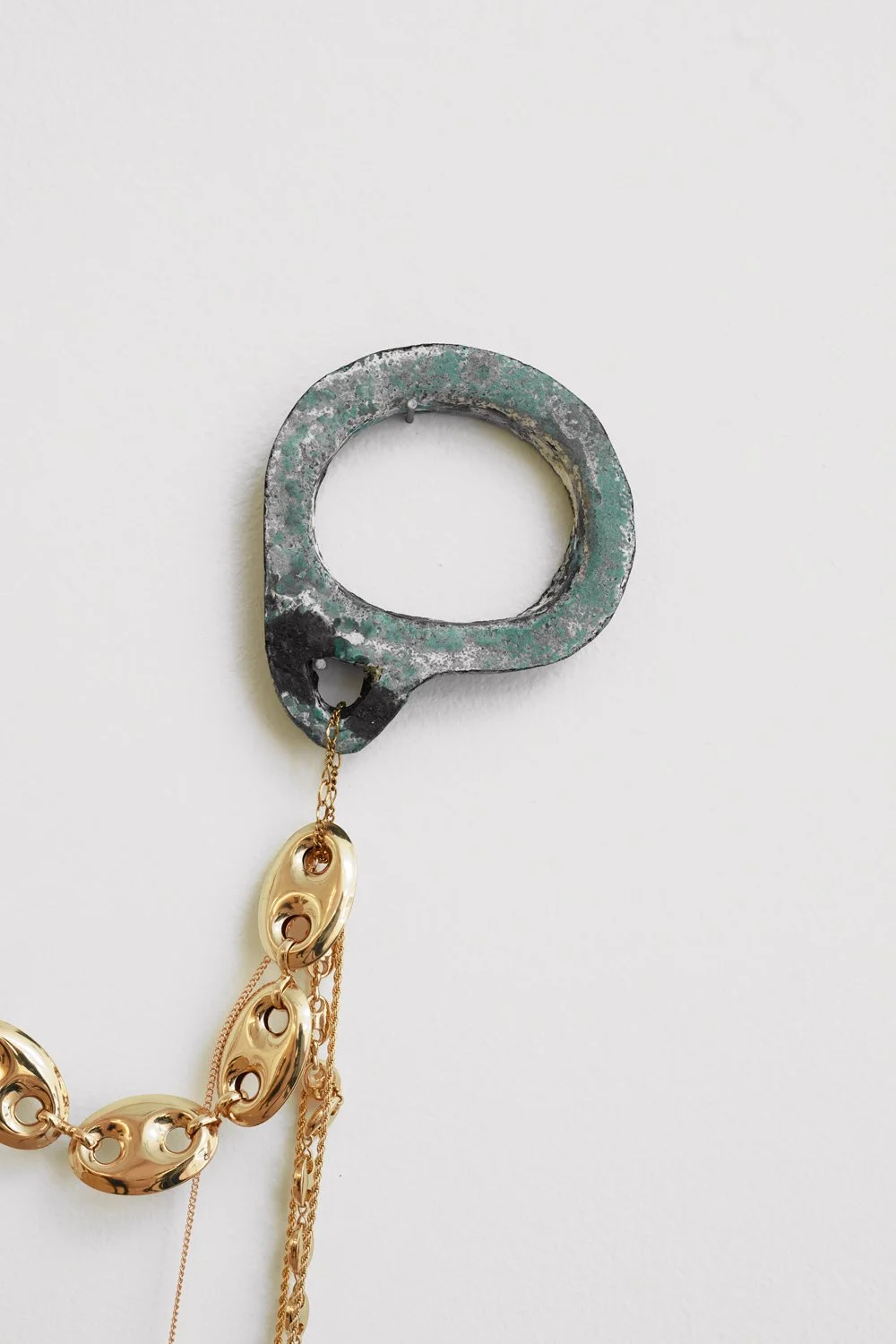    90 Miles of Cuban Links   (detail) 2017 Handcuffs and costume jewelry Variable dimensions 