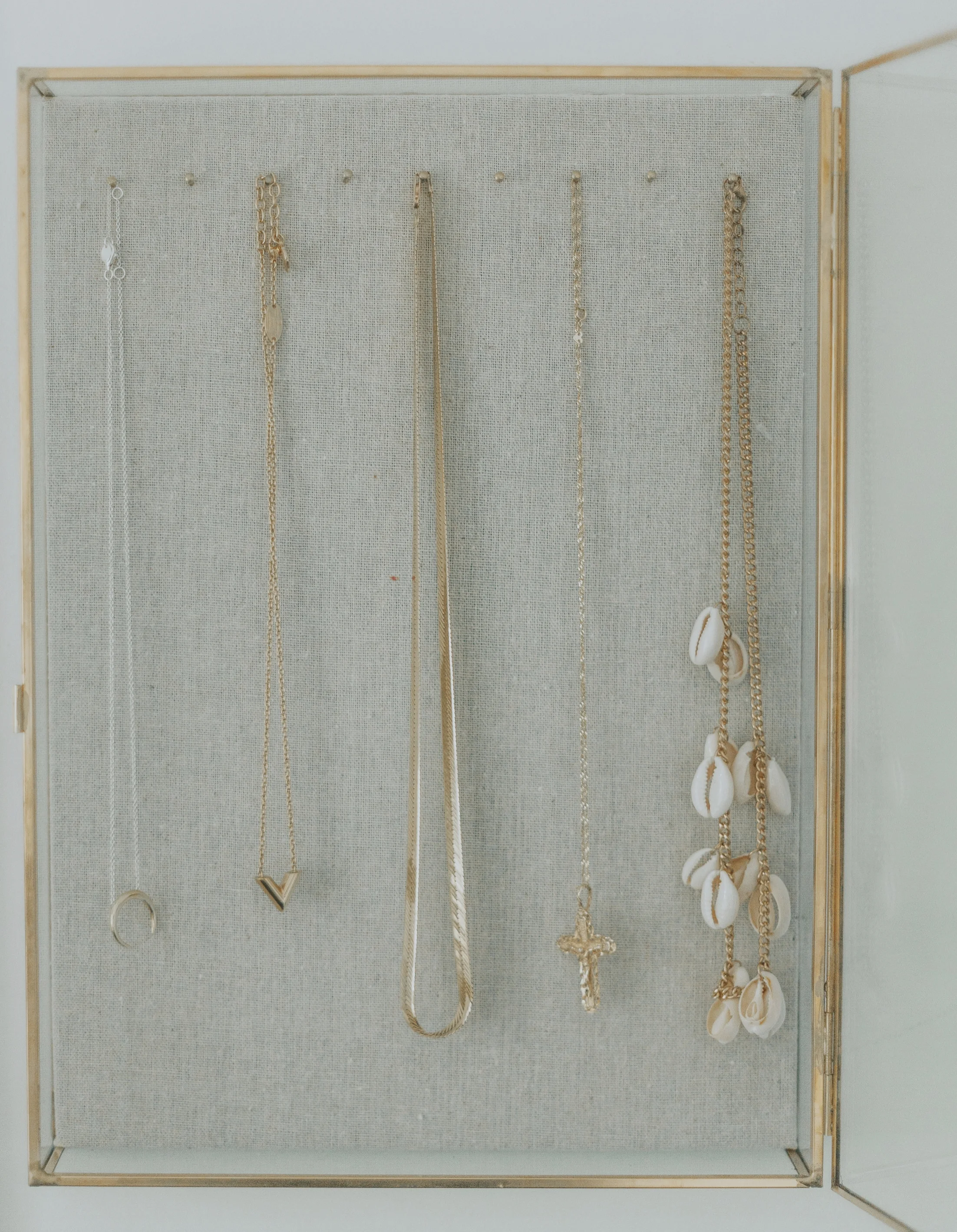 Then there are necklaces. I love layering these like I do rings! I think it looks amazing when you wear 3 or more at the same time. It's totally okay if they're the same length too! It gives a really effortless look. Also, I know what you're thinking. What the hell is the cowrie shell necklace about? I got it on etsy for beach-y, summer-y looks. I think it'll look amazing with an oversized white linen shirt with a few buttons unbuttoned. 