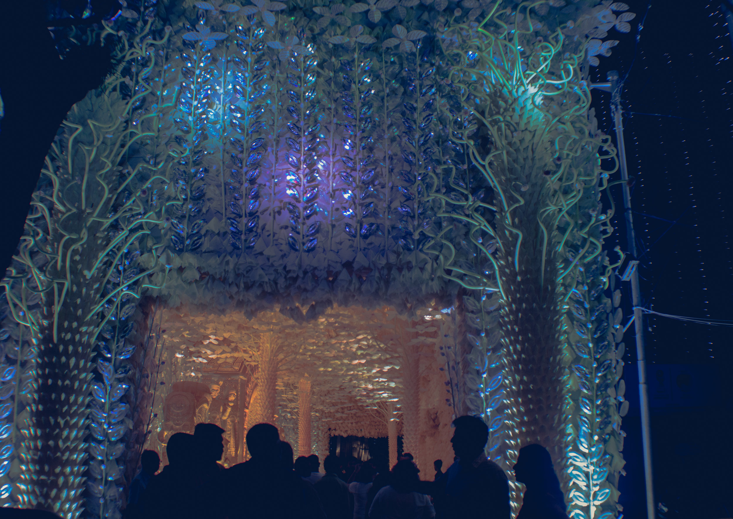  At the entrance to Mudiali Club, crowds of people gather on the third night of the festival to see Kolkata's artistry.&nbsp; 