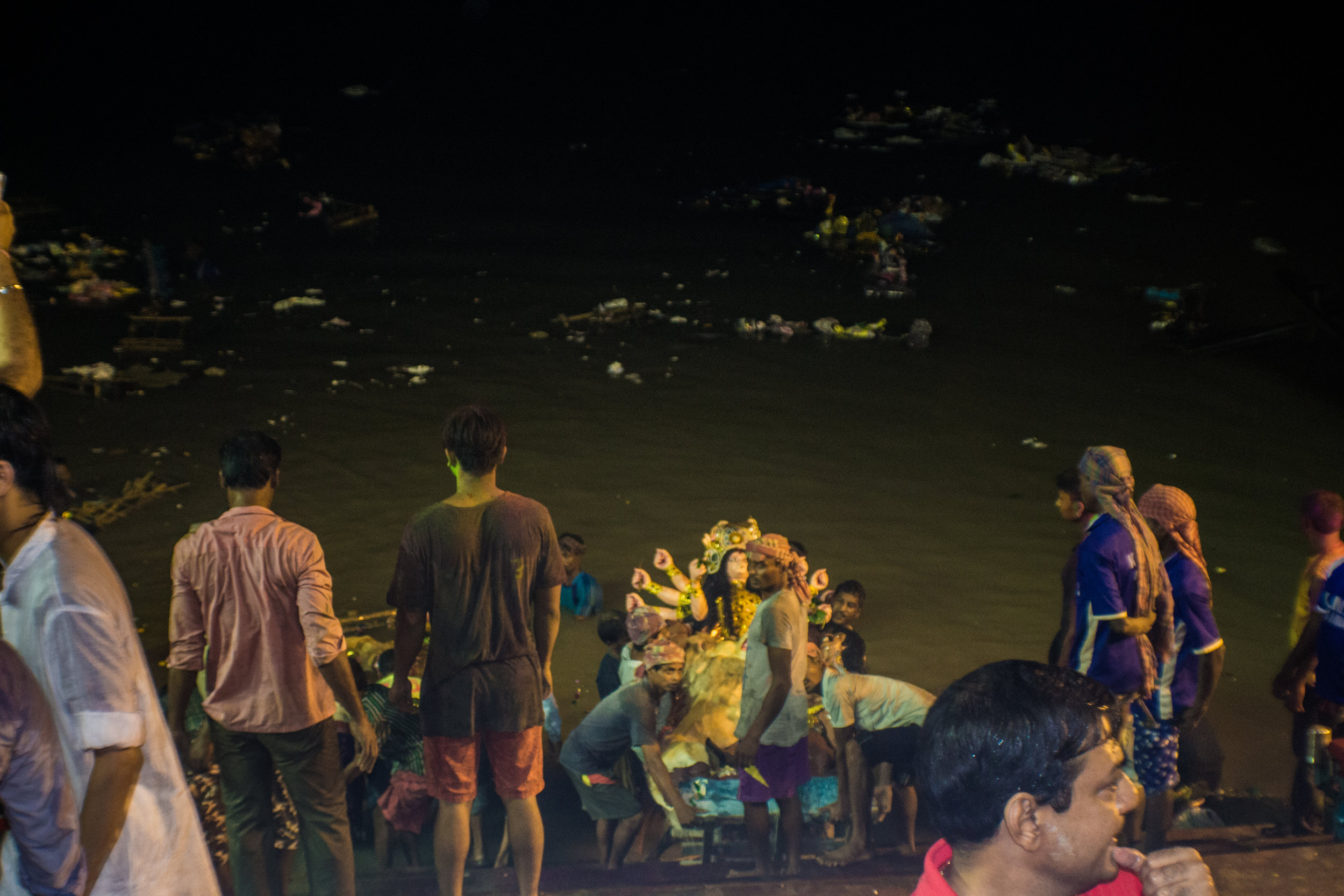  An idol is submerged into the Ganges on the tenth and final day of the Durga Puja.&nbsp; 