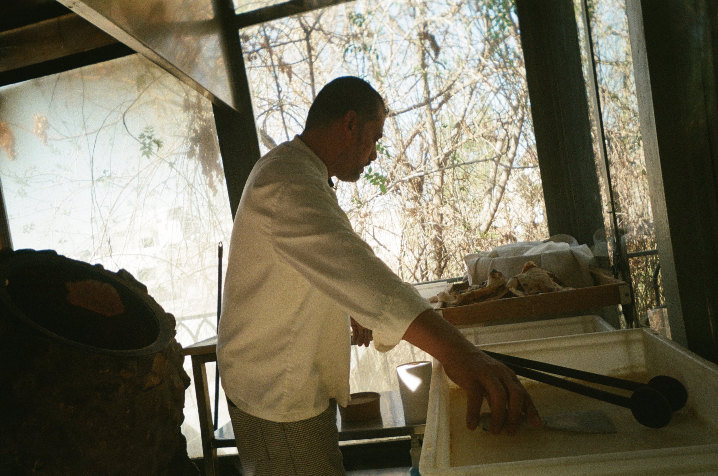 a chef makes fresh pita, amman, jordan.