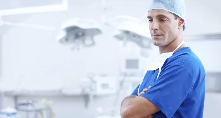 The doctor behind the screen