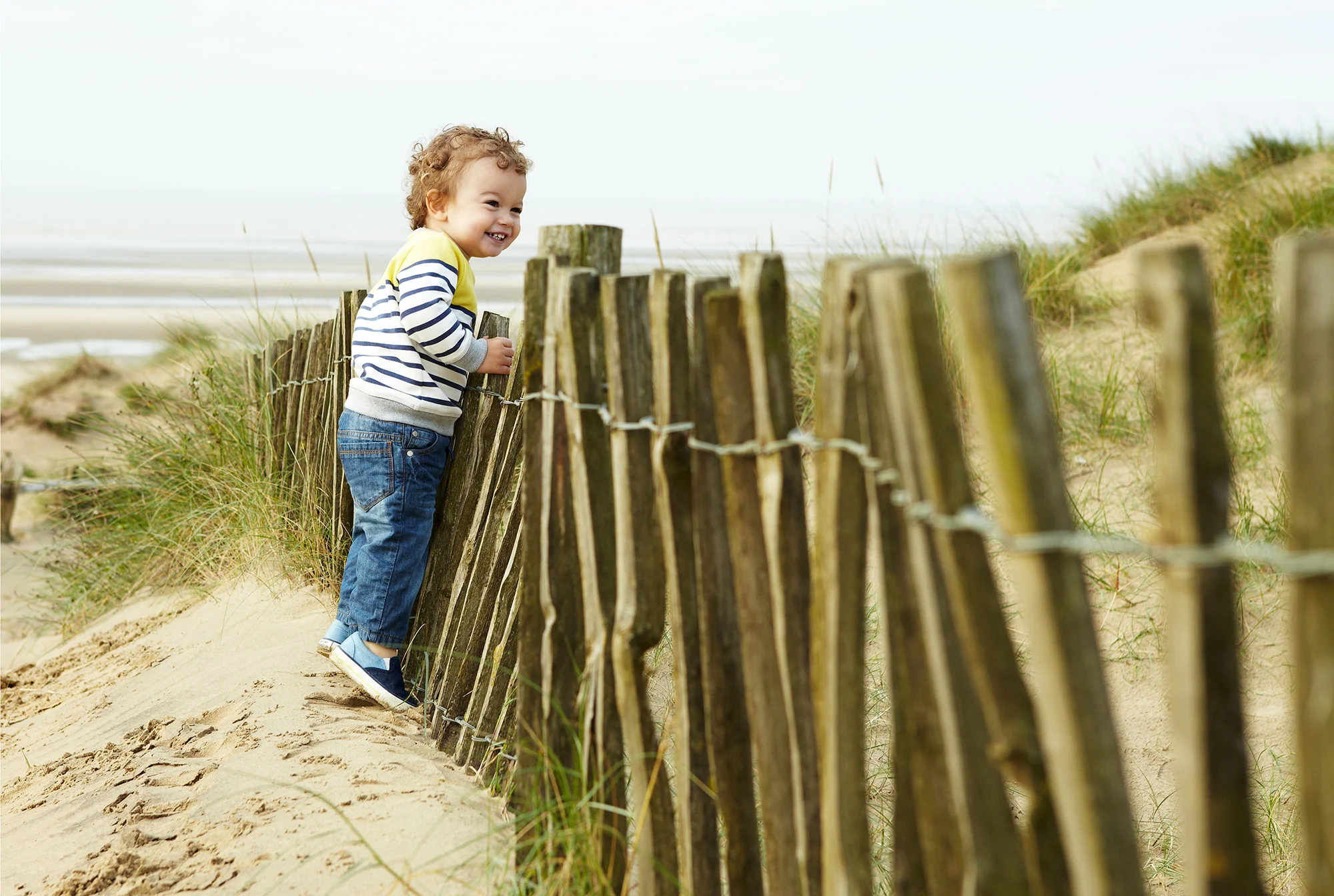 toddler_boy_at_the_beach_stripes.jpg