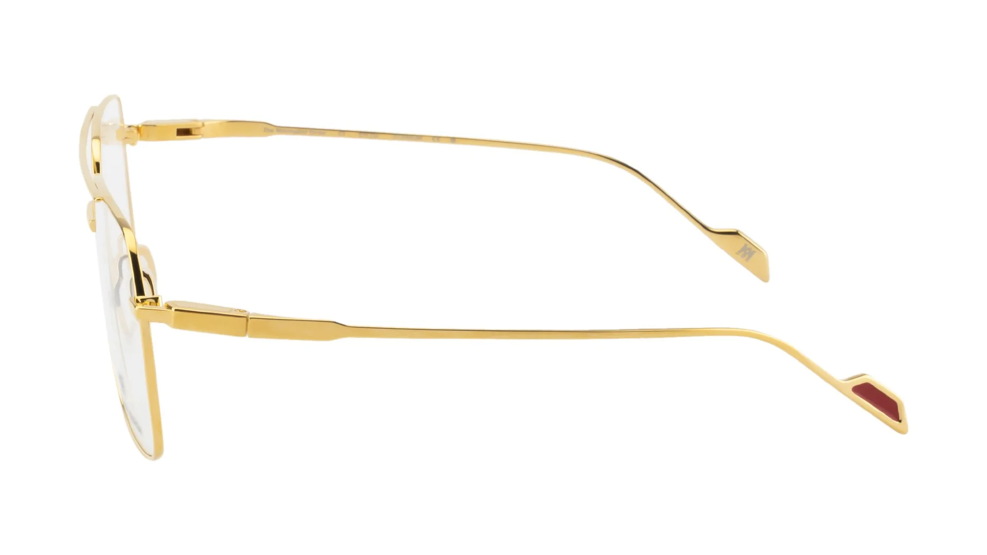   THE MINIMALIST THREE C1    Frame Colour:  18Kt Yellow Gold Plated   Lens Colour:  Transparent   Specifications:   100% Beta Titanium Frame With Gold Accents Epoxy Inlay on Temple Tip Silicon Nose Pads   Size:  57-14 