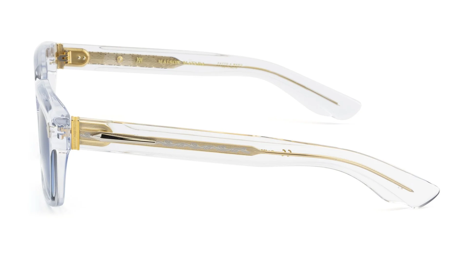   LUX 1 C.1203    Frame Colour:  Clear   Lens Colour:  Blue Gradient   Specifications:   Mazzucchelli acetate – 100% Italian and of natural origin Pins riveted to both the front piece and the temples 100% UV Protection   Size:  53-19-148 