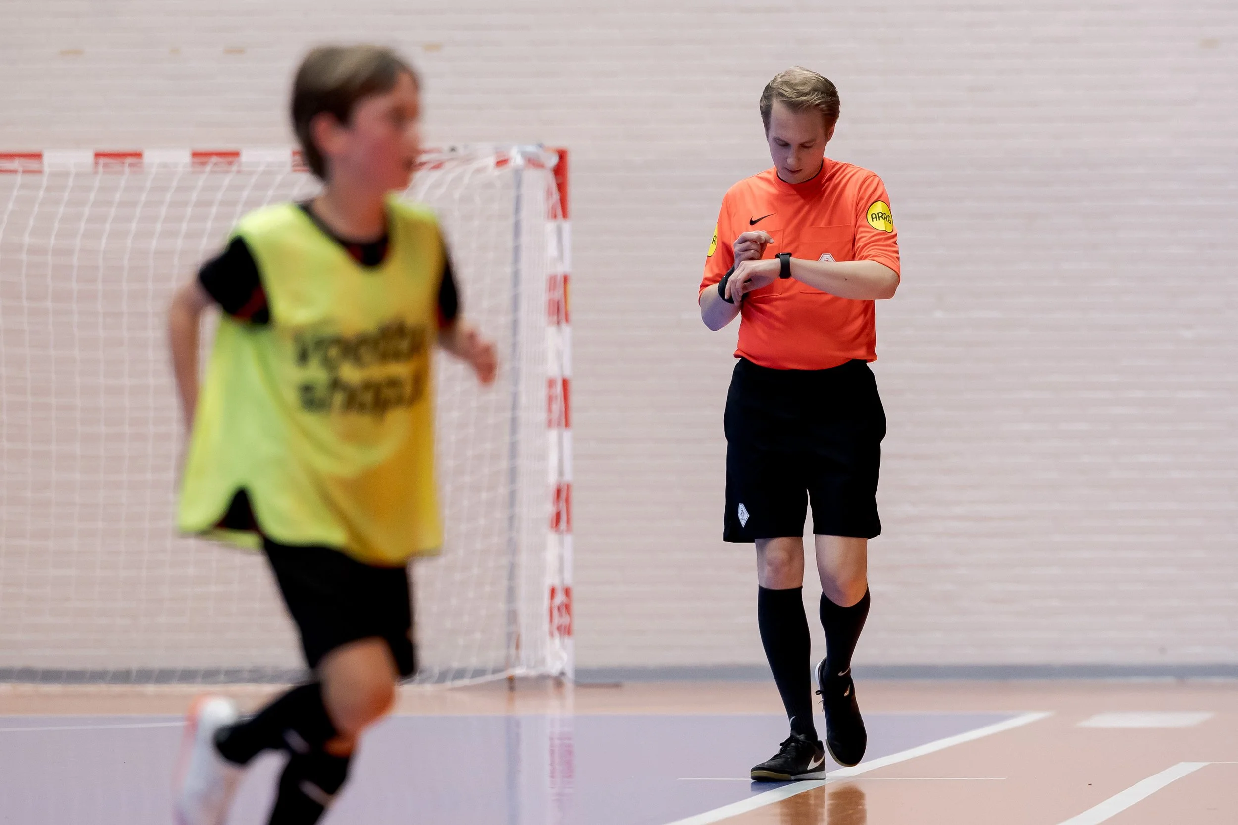Referee Jurien entering match information on REFSIX during the match