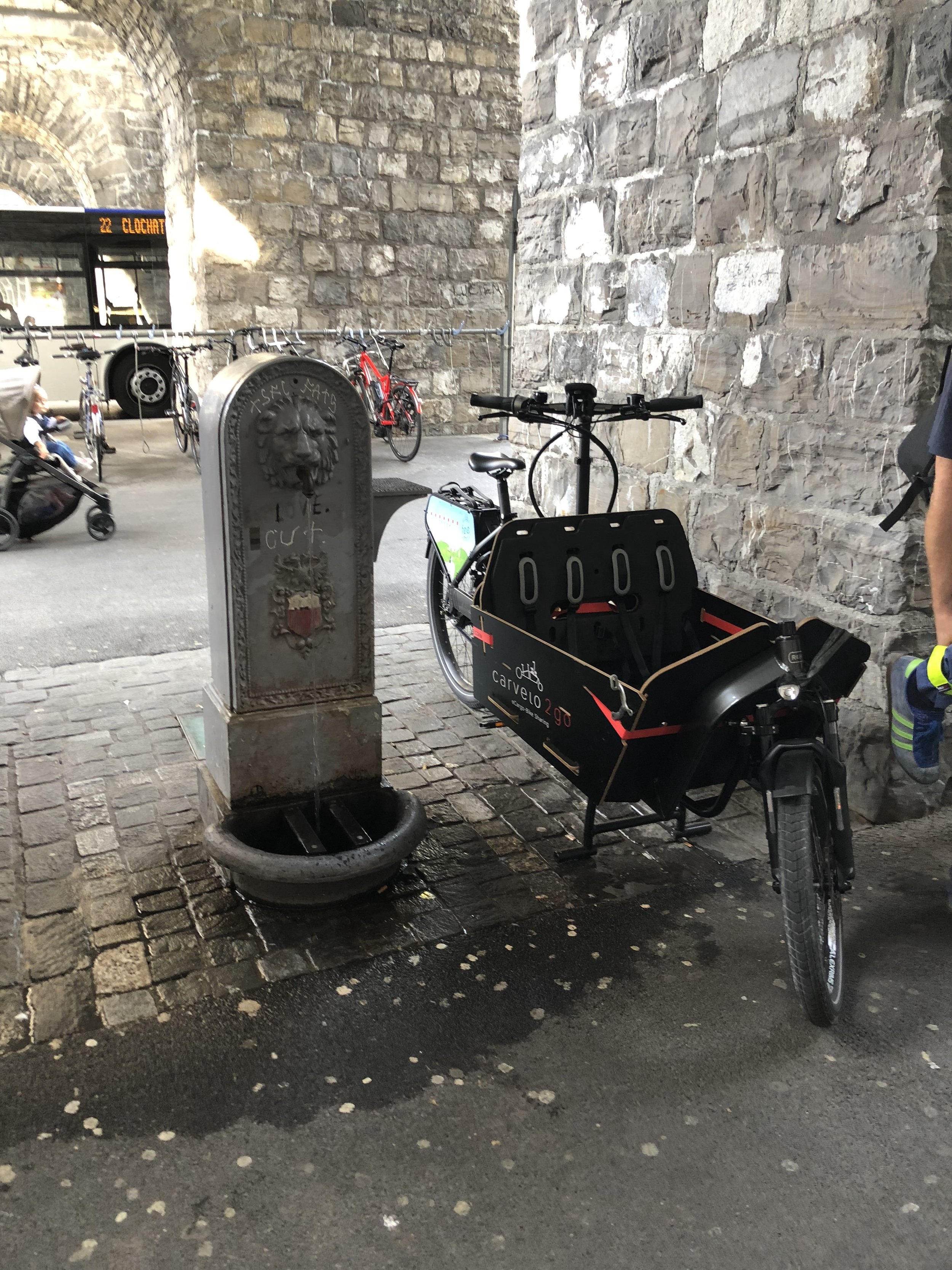  A carvelo2go station located in the centre of the city, underneath a soon-to-be cyclists and pedestrians-only bridge.    