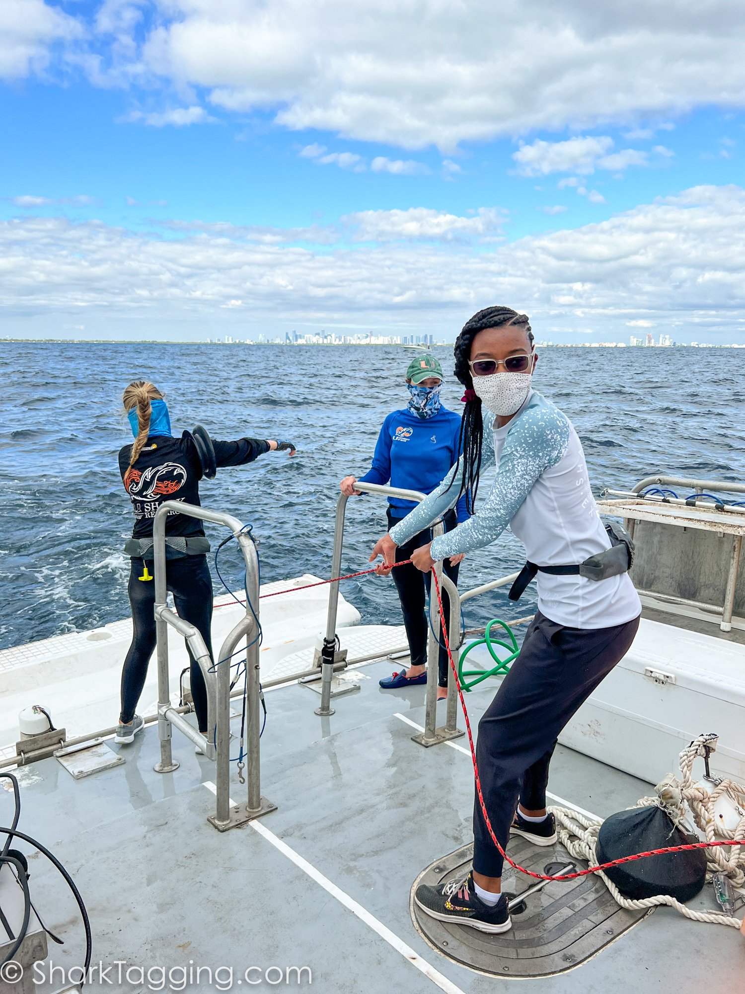 BGD Scholar Kaiya checks with her teammates as they tow the line