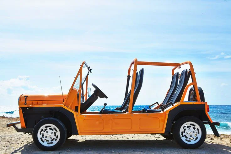 This is the MOKE. This is a brand new very nice MOKE. This is also a very nice photo. Imagine this as red, dented and dirty with torn and sun faded seats, no windshield, a little lower to the ground with bald tires. That would be the one he wanted us to rent. As nice as this picture is I still would never rent this for any reason, certainly not to go off road to secluded beaches all the way at the other end of the island.