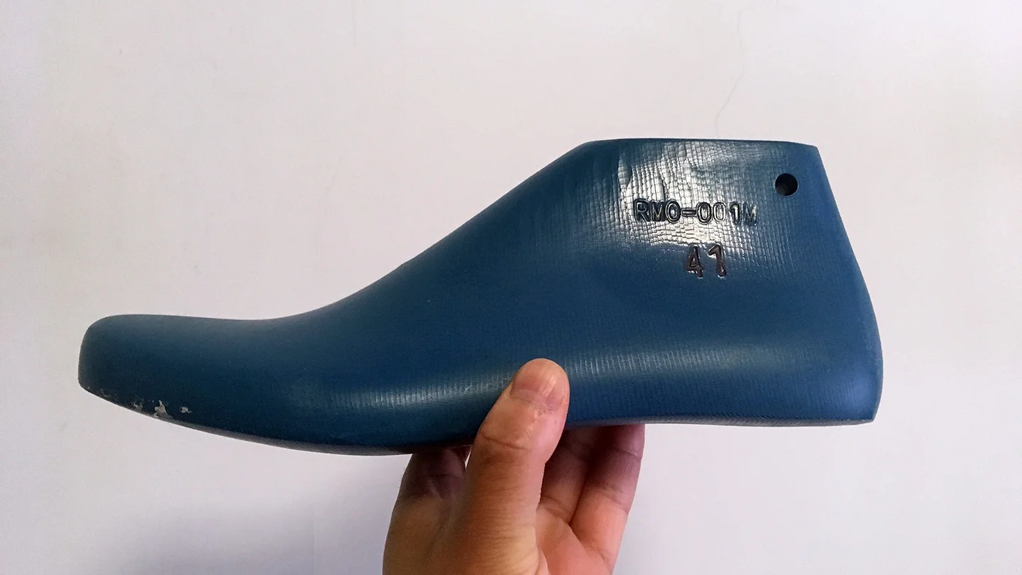 A picture of a most common type of plastic shoe last.