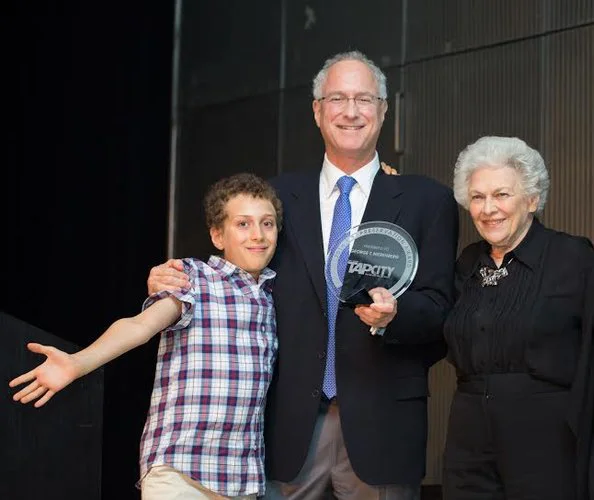 George T. Nierenberg receiving the American Tap Dance Foundation Tap Preservation Award in 2014 for the superior advancement of tap dance through presentation and preservation. (George's son Jack, George, George's mother Juliet. 