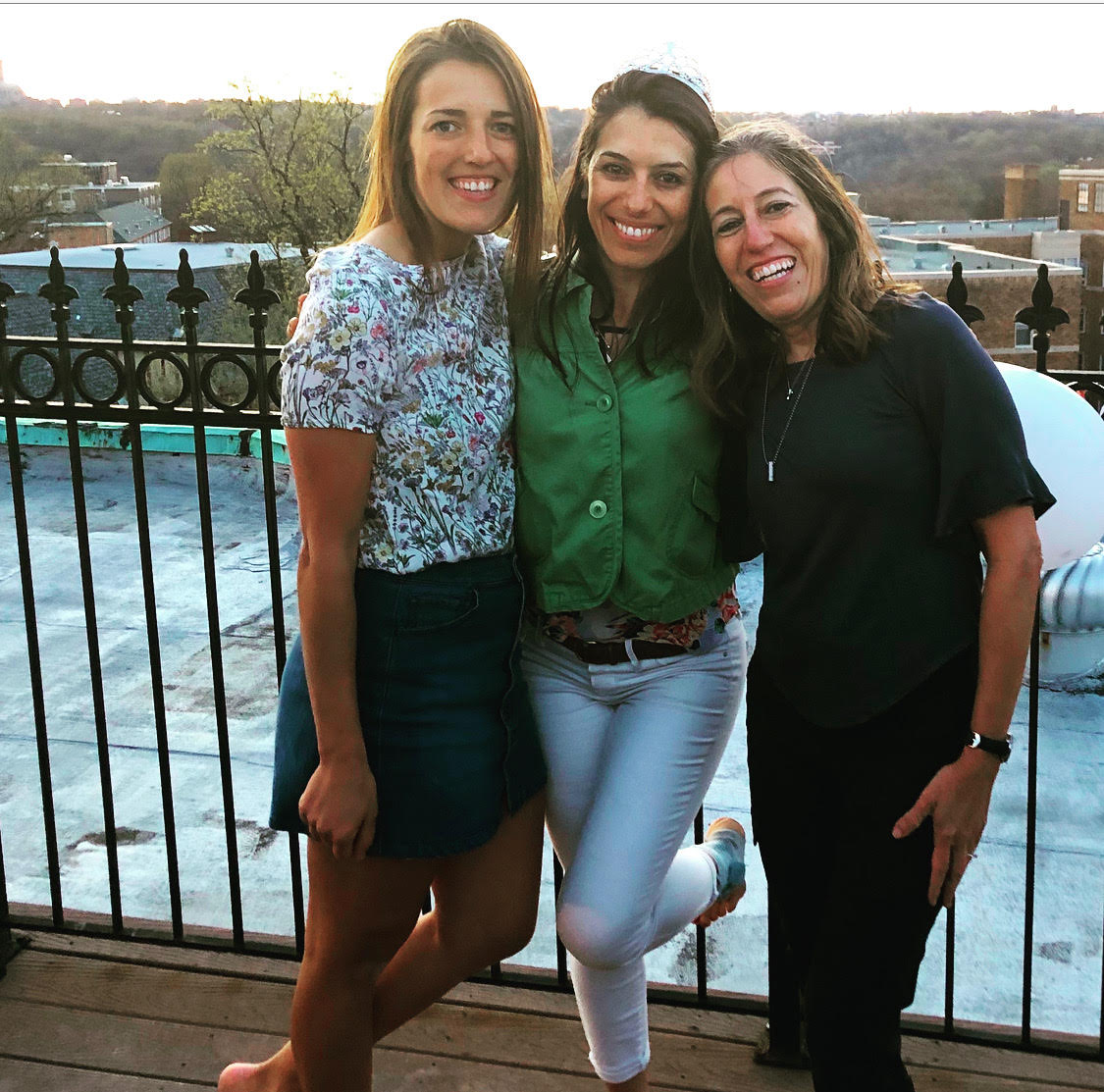 Rooftop vibes with my daughter and I flanking the birthday girl.