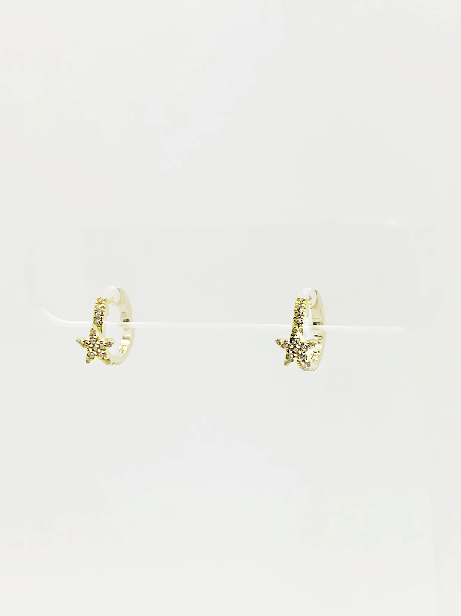 CZ HUGGIE HOOP WITH STAR EMBELLISHMENT