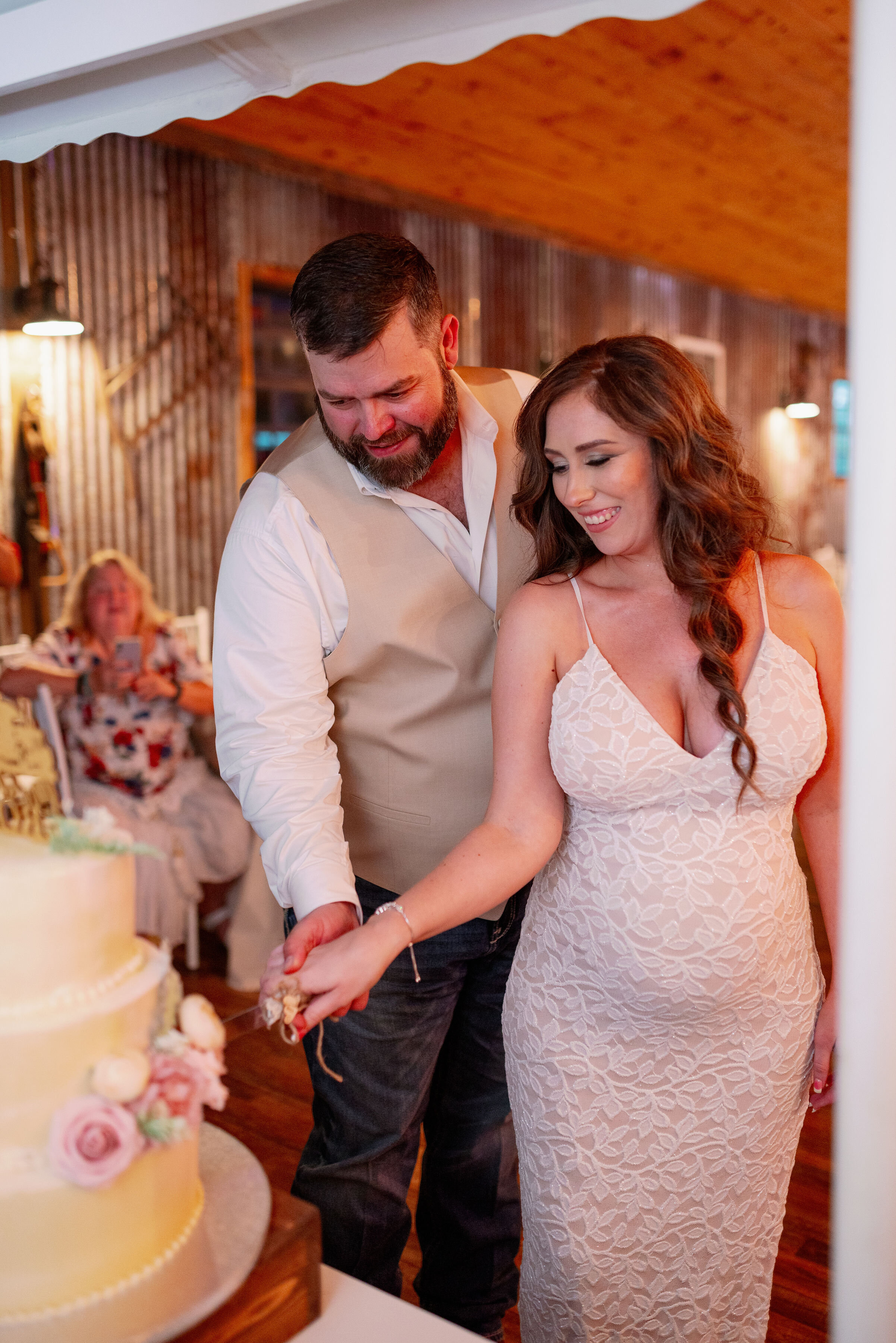 bride and groom cutting cake.jpg